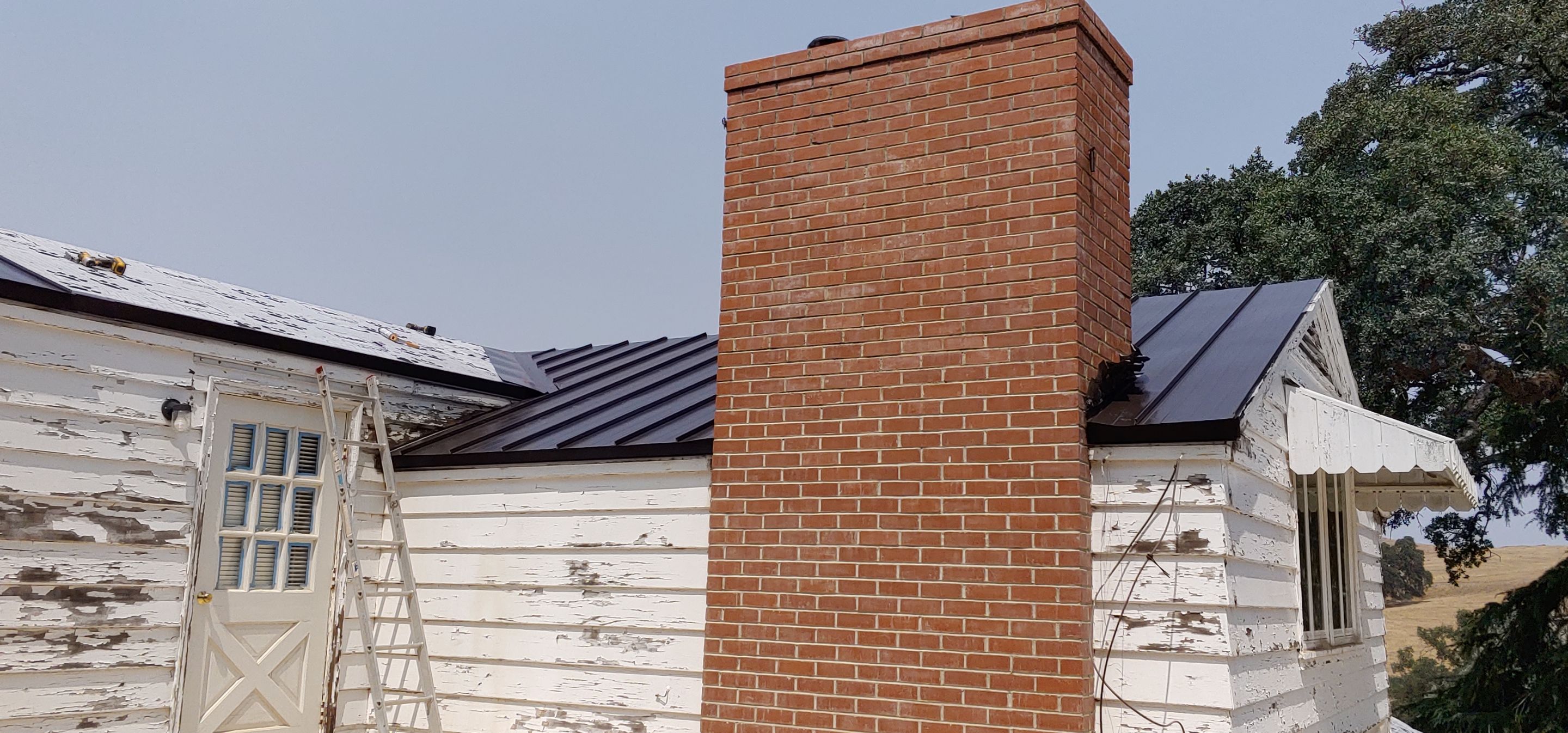 Residential Roofing Installation using Standing seam metal roofing system by Straight Edge Roofing Inc