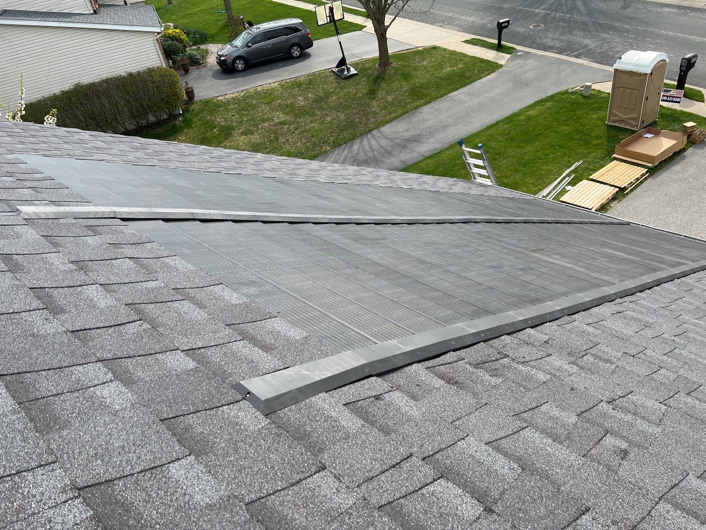 Solar Roof Replacement using GAF Timberline Solar Shingles by American Home Contractors