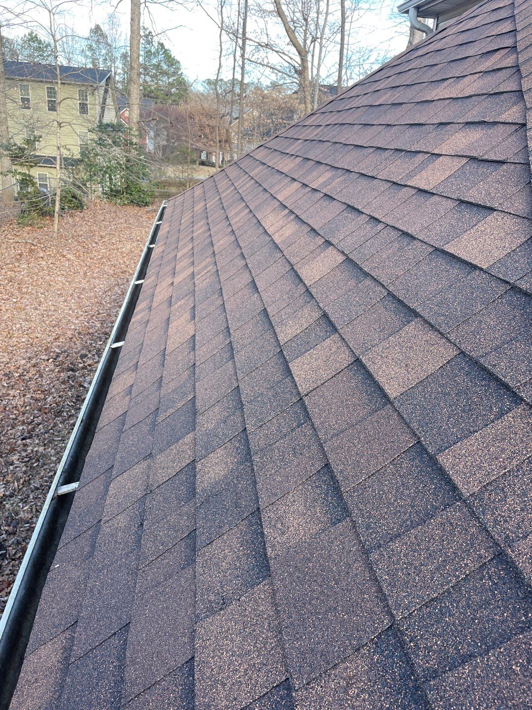 Cleaning Gutters  by Deerfield Roofing LLC