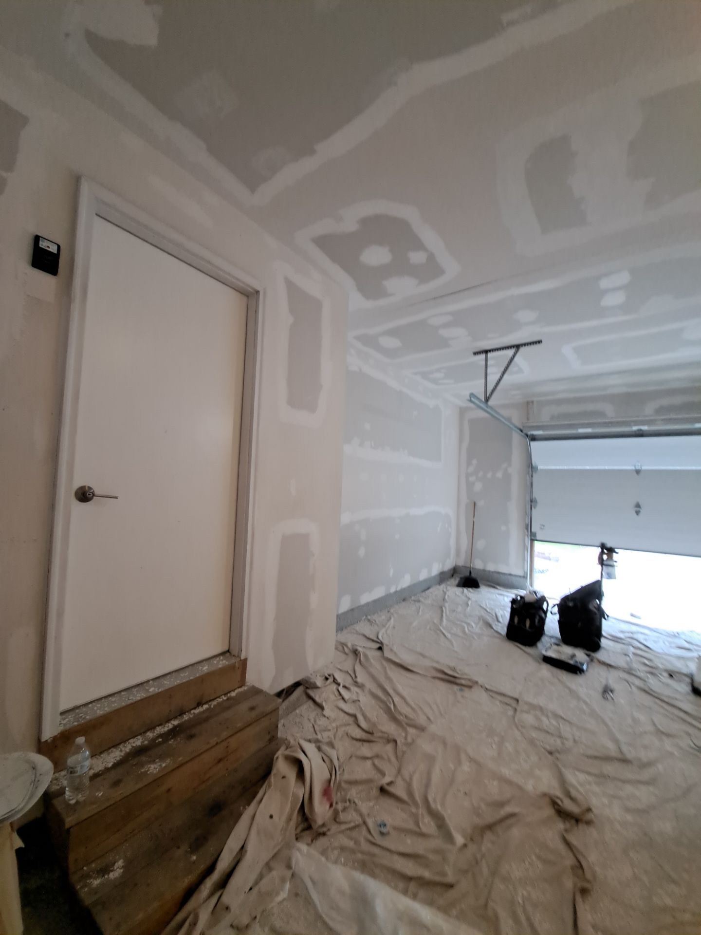 Garage dry wall repair/ re-texture, re-paint by Gordon Painting