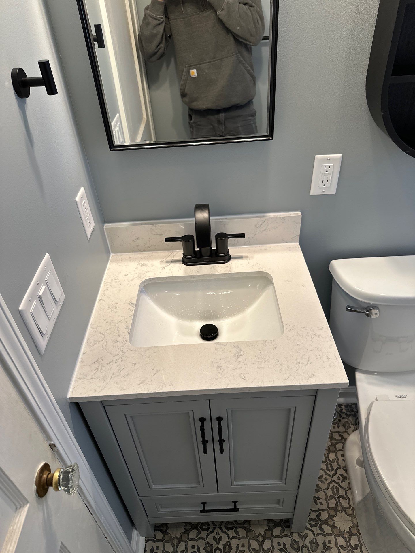 Sleek Bathroom Refresh by ProCore Contractors