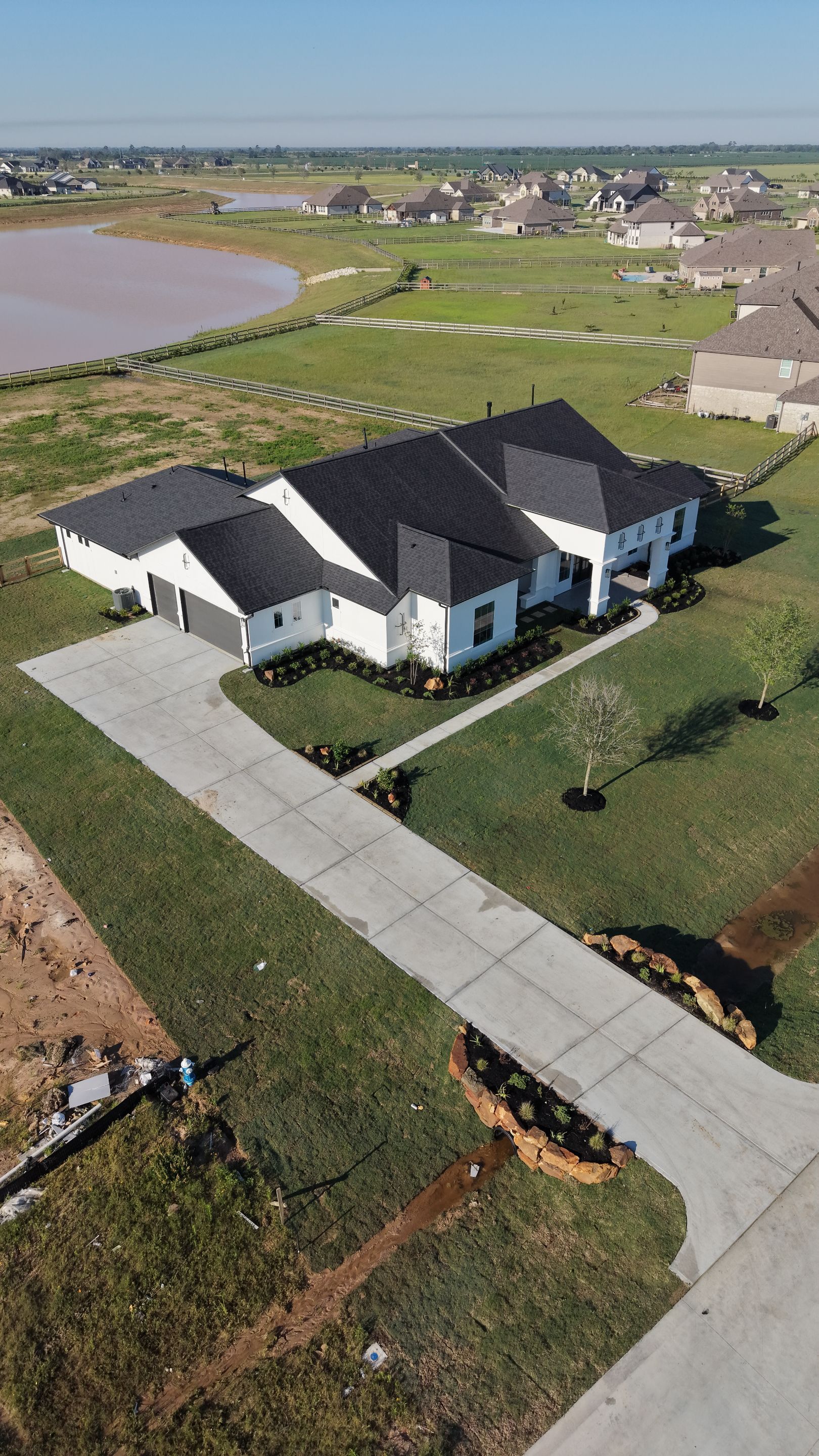 Custom Stucco Masterpiece with Precision Foam Detailing – Waller, TX by Apex Conventional Stucco Llc