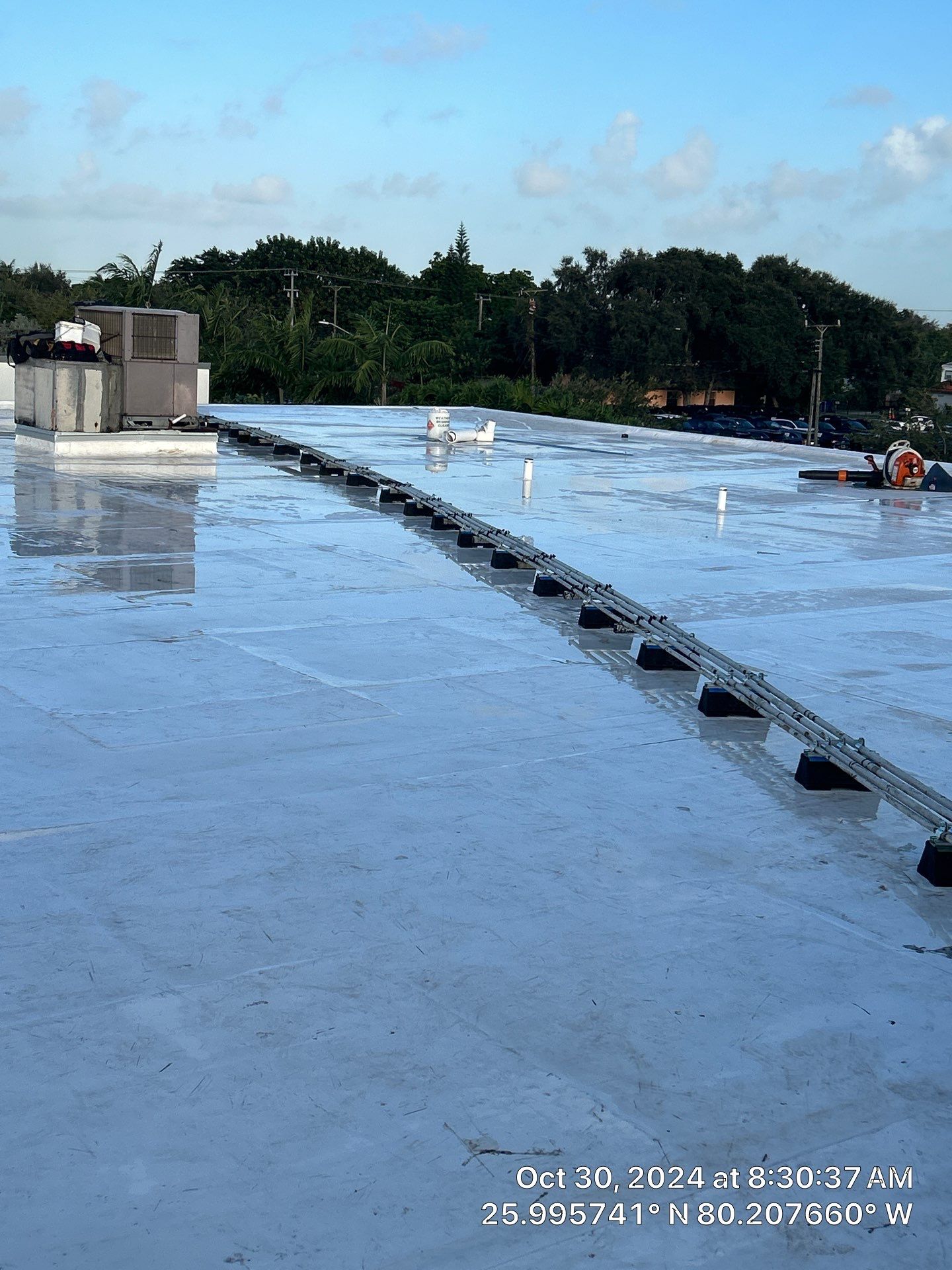 COMMERCIAL REROOF GAF TPO EVERGUARD 60 MIL SMOOTH WITH 1-1/2" INSULATION by Earl W. Johnston Roofing