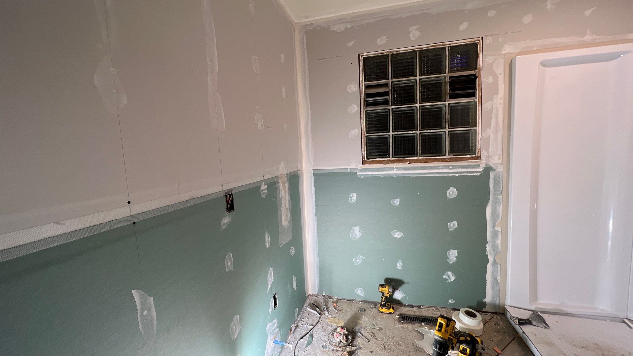 Bathroom Remodel using Shower Kit by Villegas Remodeling, LLC