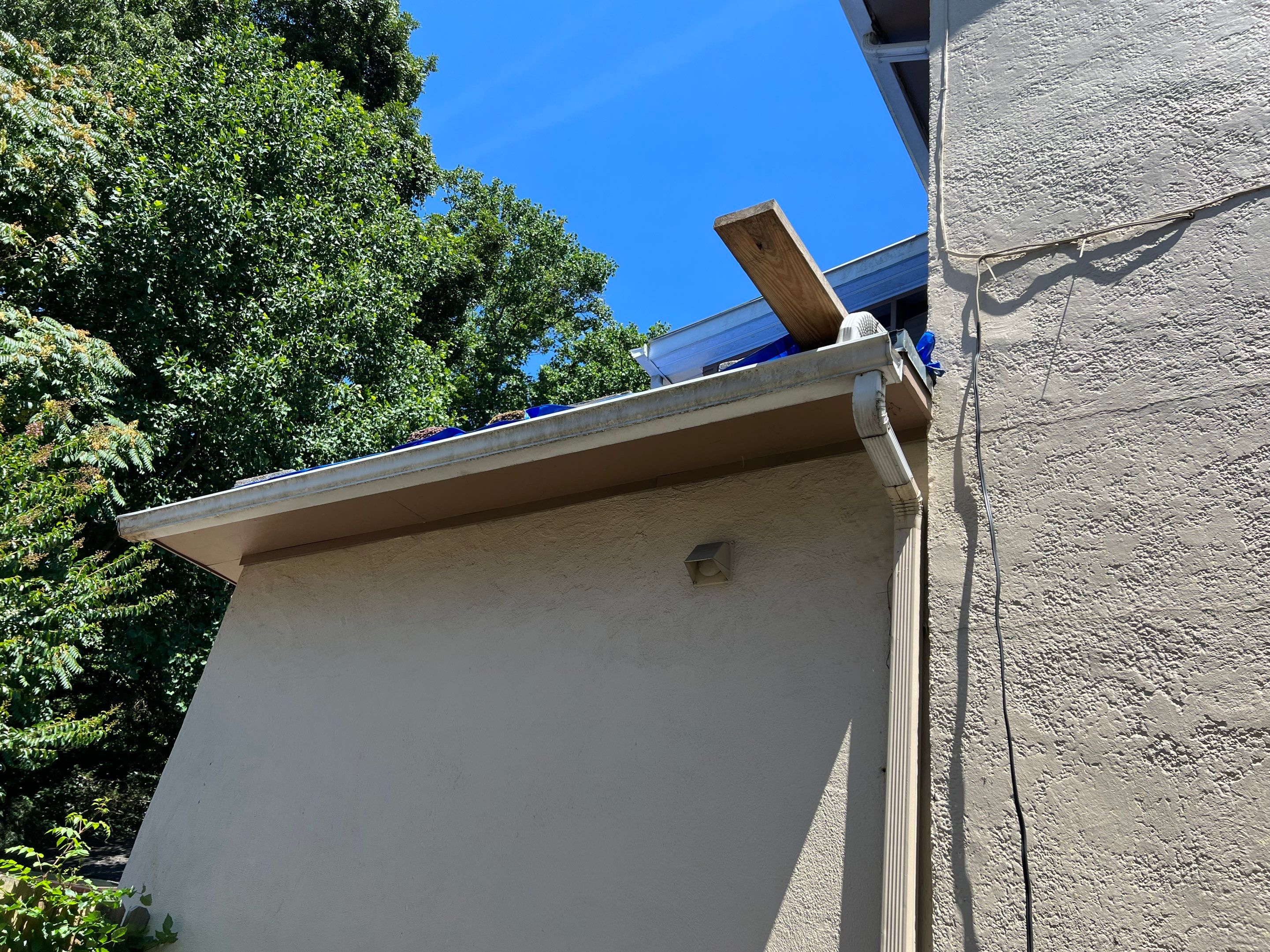 Rubber Roof and Gutter on Addition  by Secure Construction Company Inc