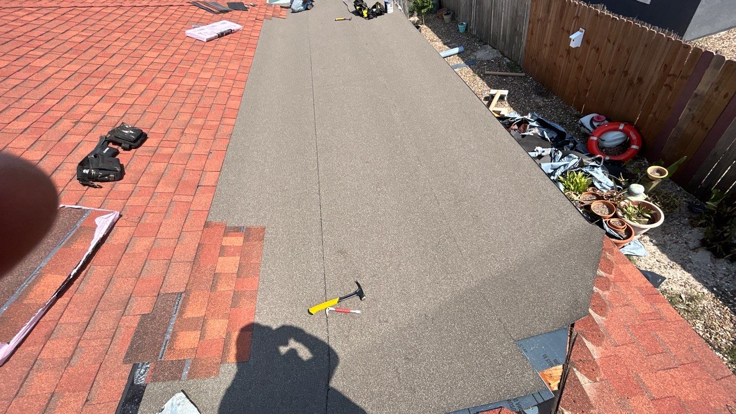 Residential Roofing Installation using Flat Roof System by Lighthouse Roofing