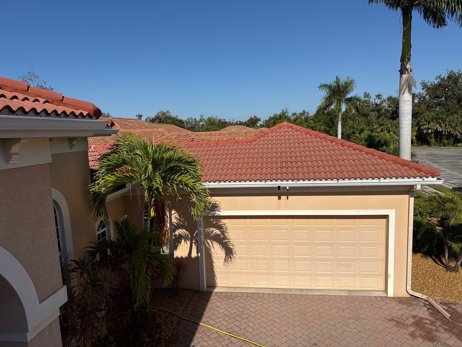 Tile Roof Cleaning & Oil Stain Removal | Tara River Place, Bradenton FL by Sunshine AquaWash
