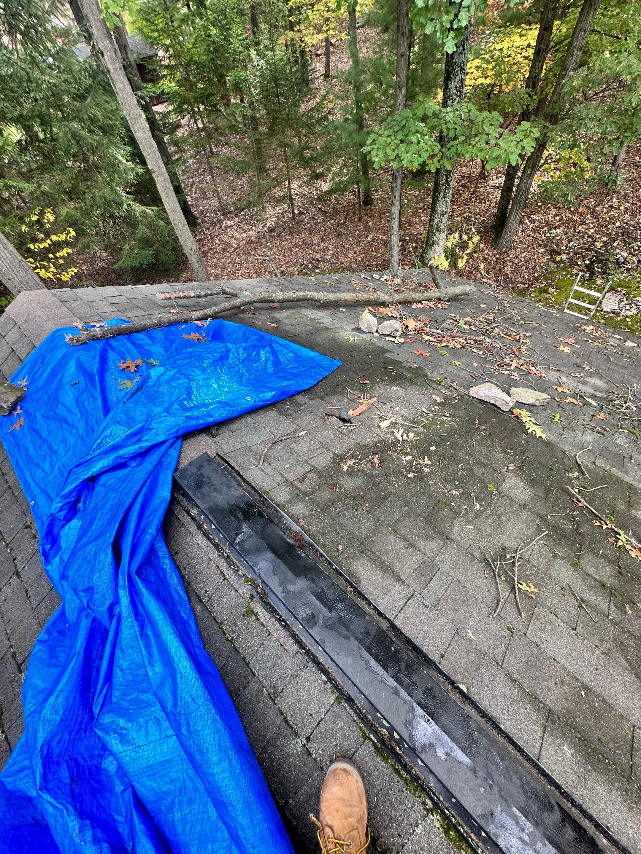 Insurance repair and chimney saddle installation. by Teflon Roofing
