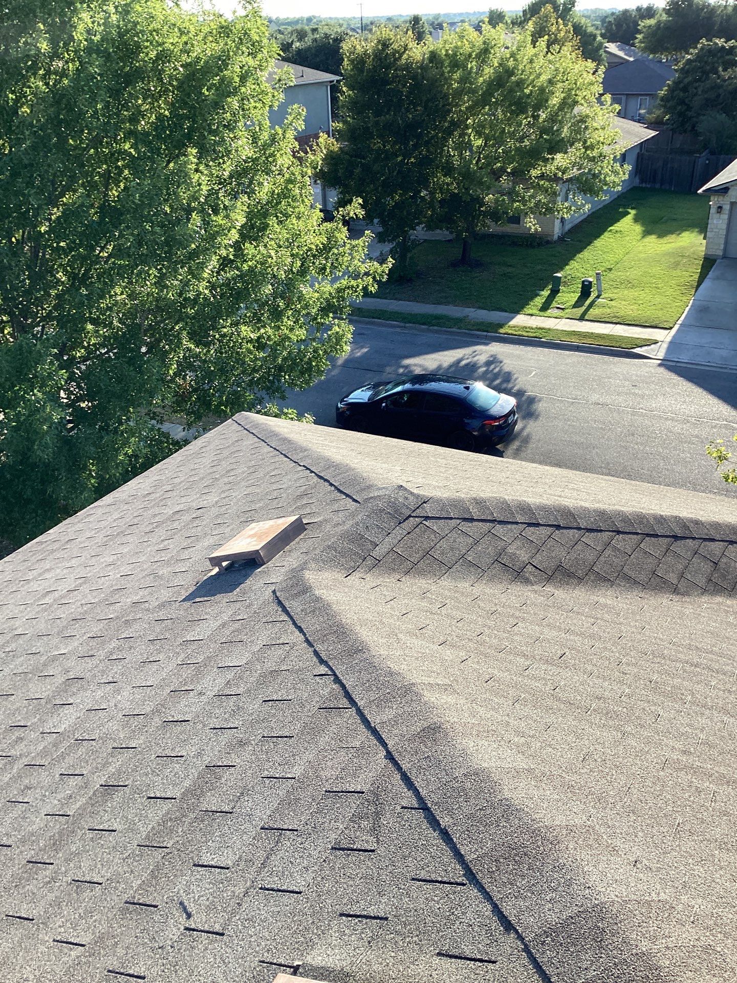 Asphalt Shingle Roof Replacement and Hail Damage Restoration in Hutto by Caliber Restoration LLC