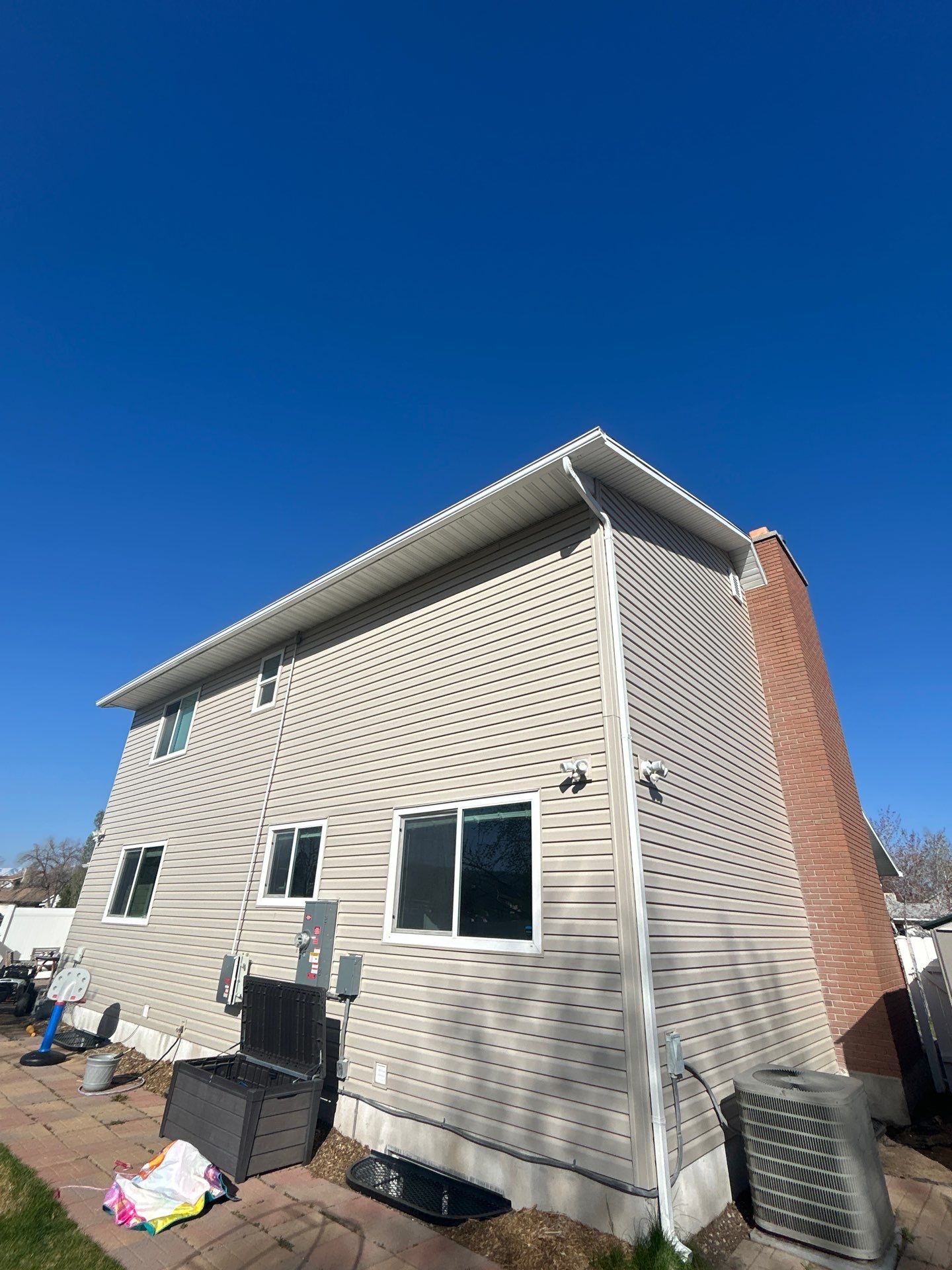 Sandy | Strategic Hardie & Vinyl Integration | Cobble Stone & Desert Sand by Ideal Siding Utah