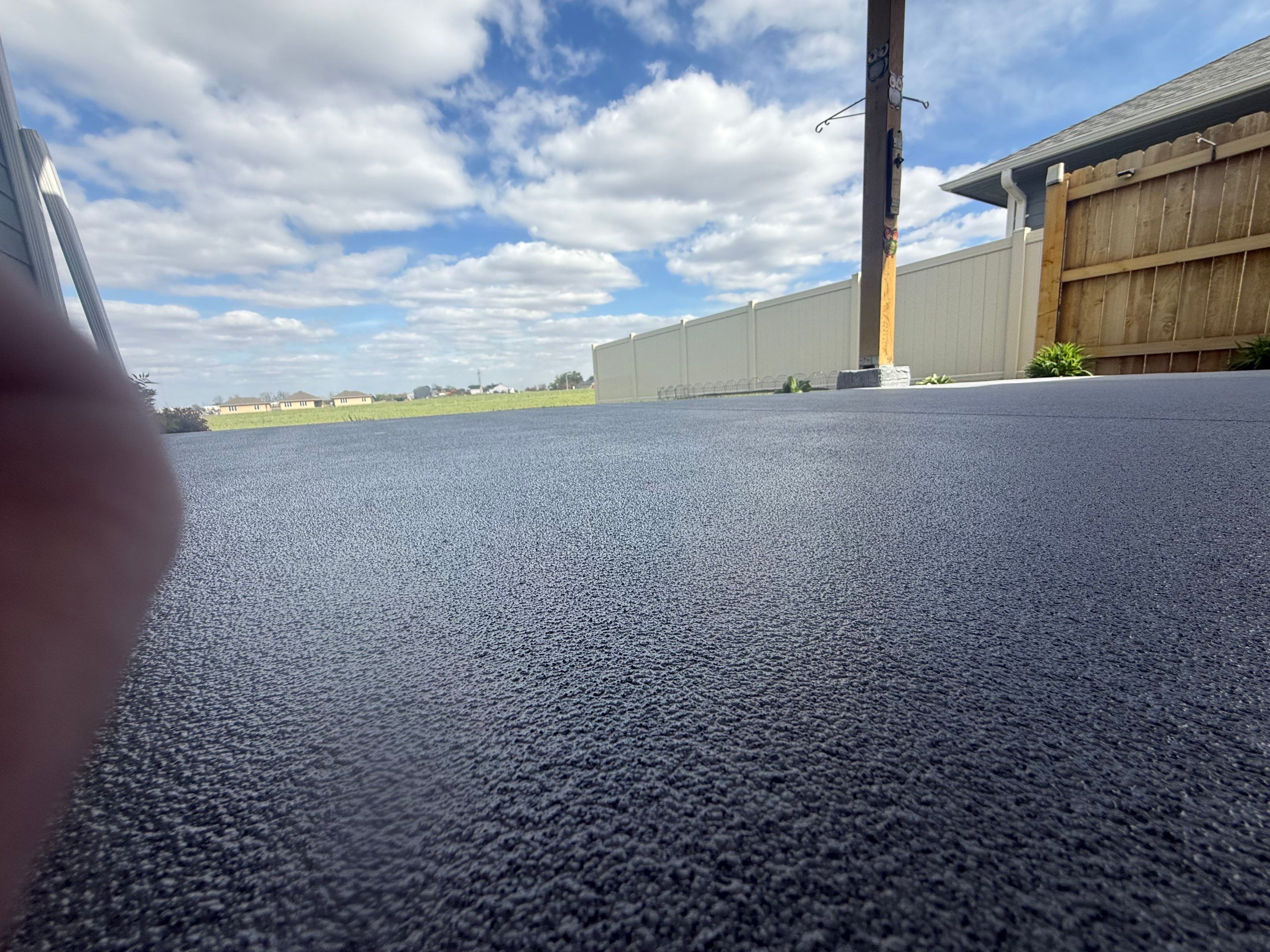 Decorative Flake Concrete Coating for Sioux Falls Porch and Patio by Select Painting, Coatings & Garage Cabinets