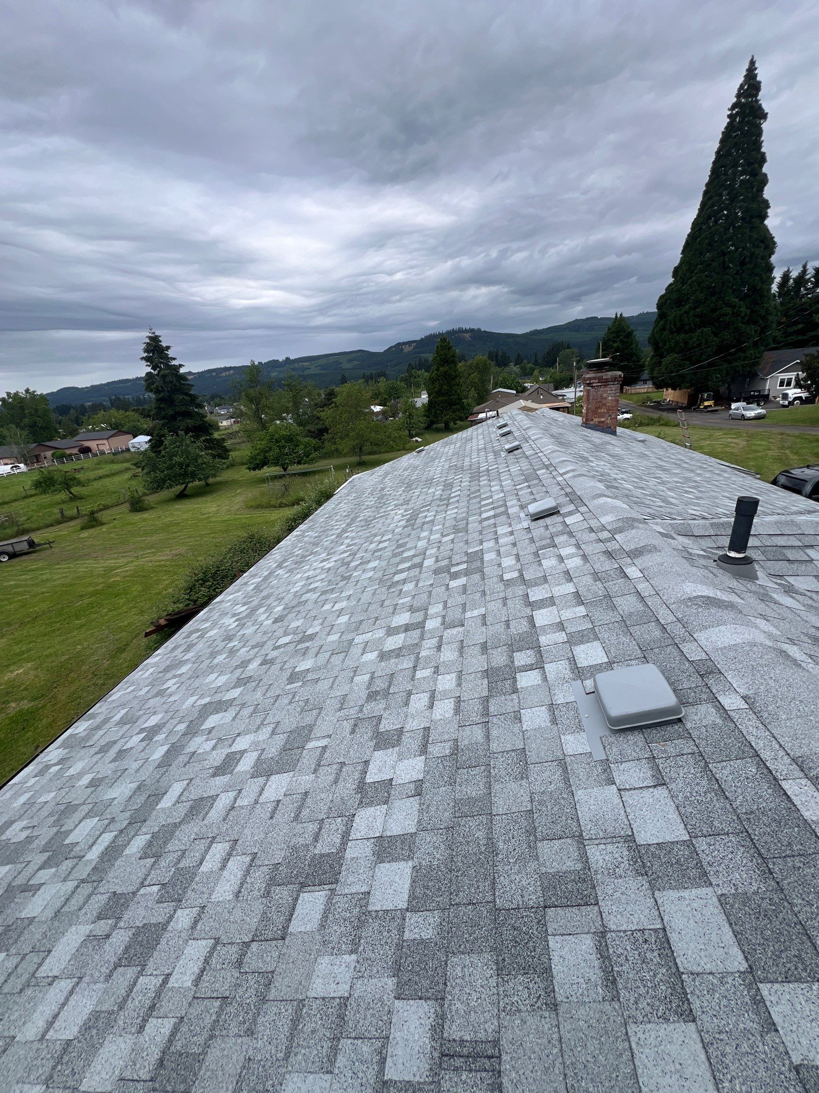 Residential Roofing Installation using IKO Dynasty (Color: Frostone Grey) by Orezona Building & Roofing Company, Inc.