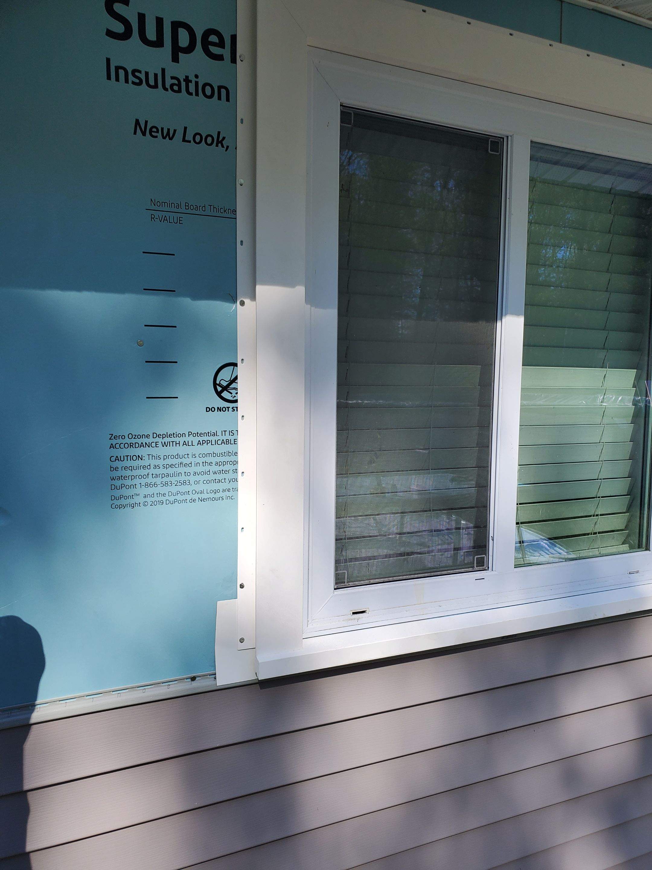 Siding Installation using insulation, PVC trim and vinyl siding by UBrothers Construction
