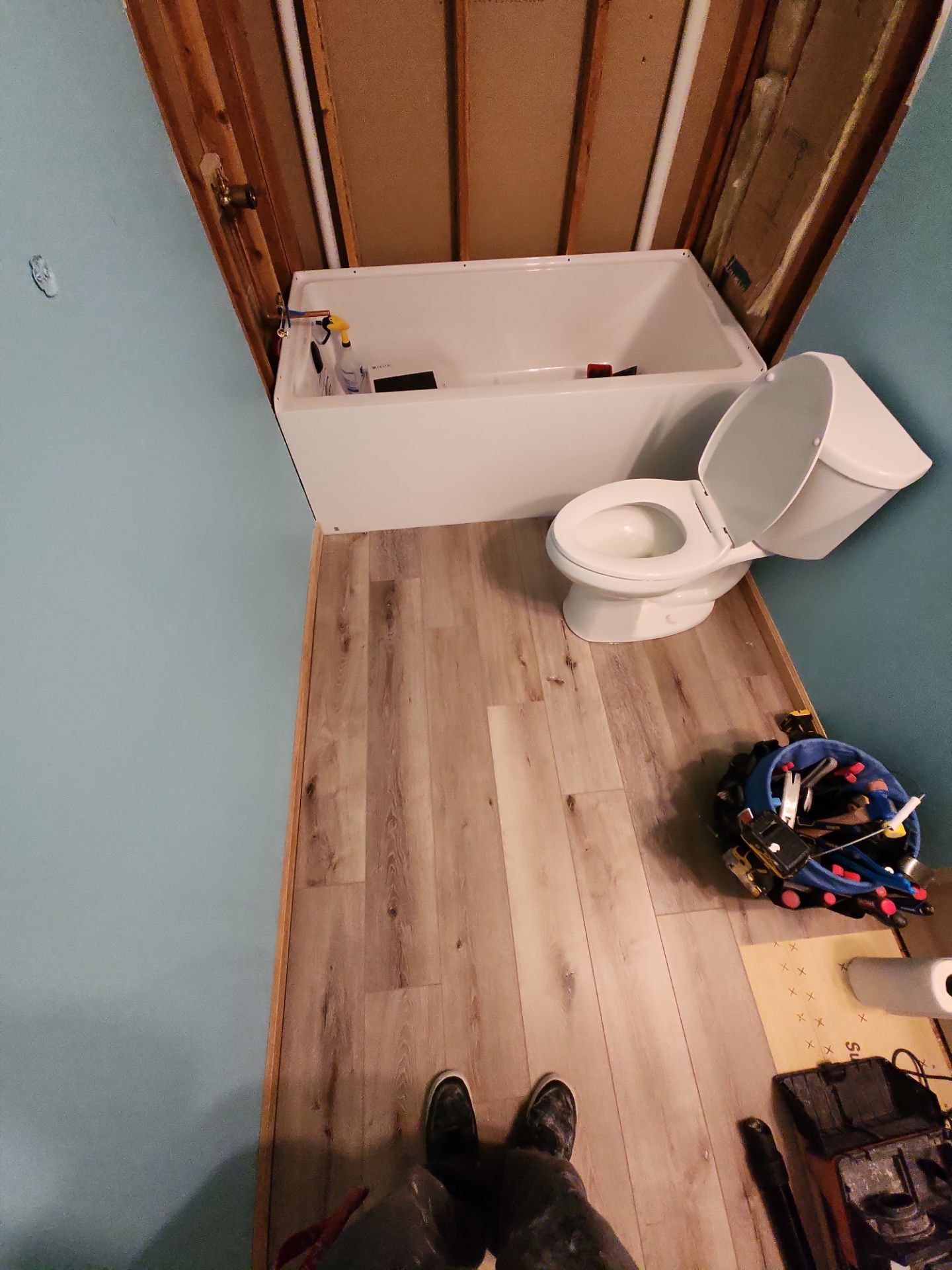 Bathroom Remodel using Luxury Vinyl Plank by The Shower Company
