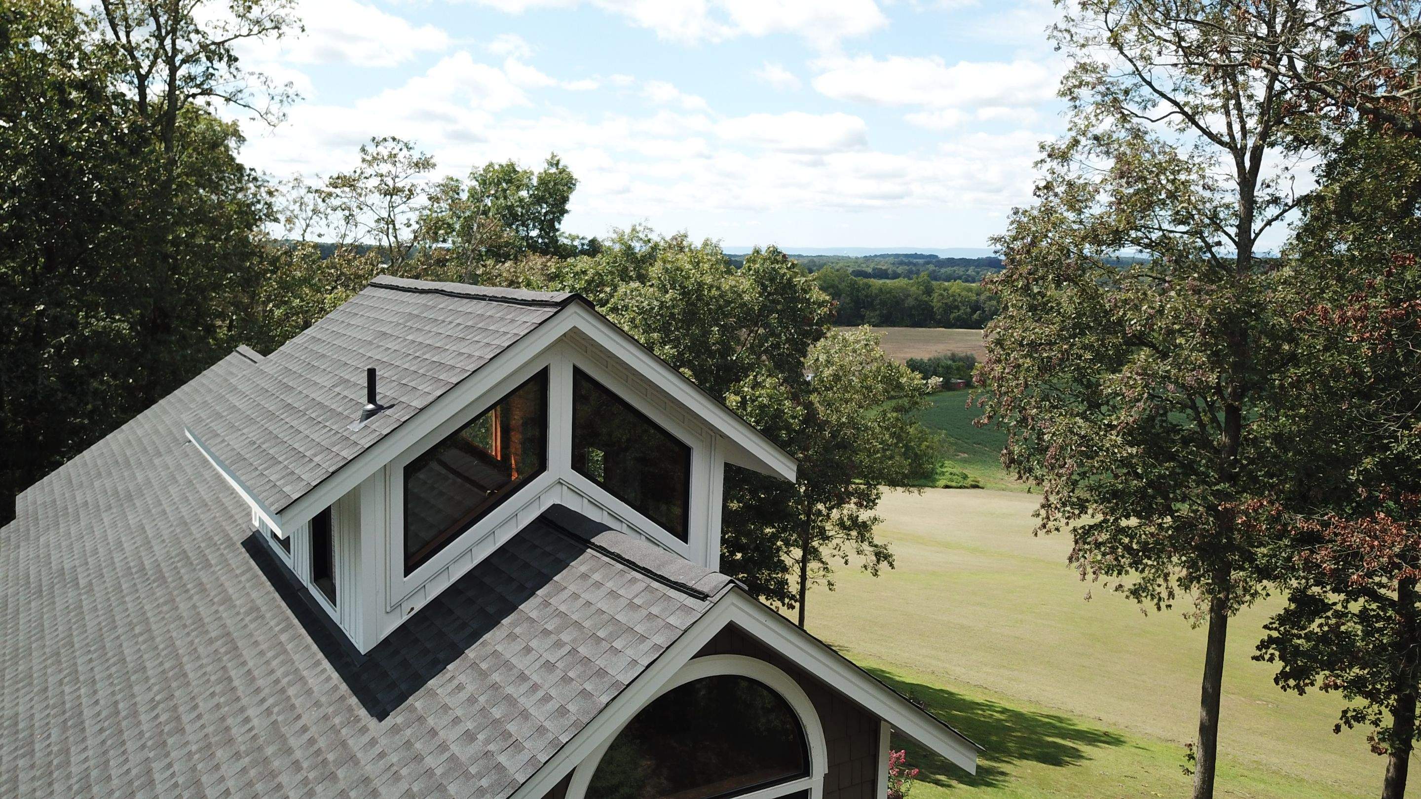 Roof, Siding, Soffit, Trim, and Gutter replacement by American Home Contractors