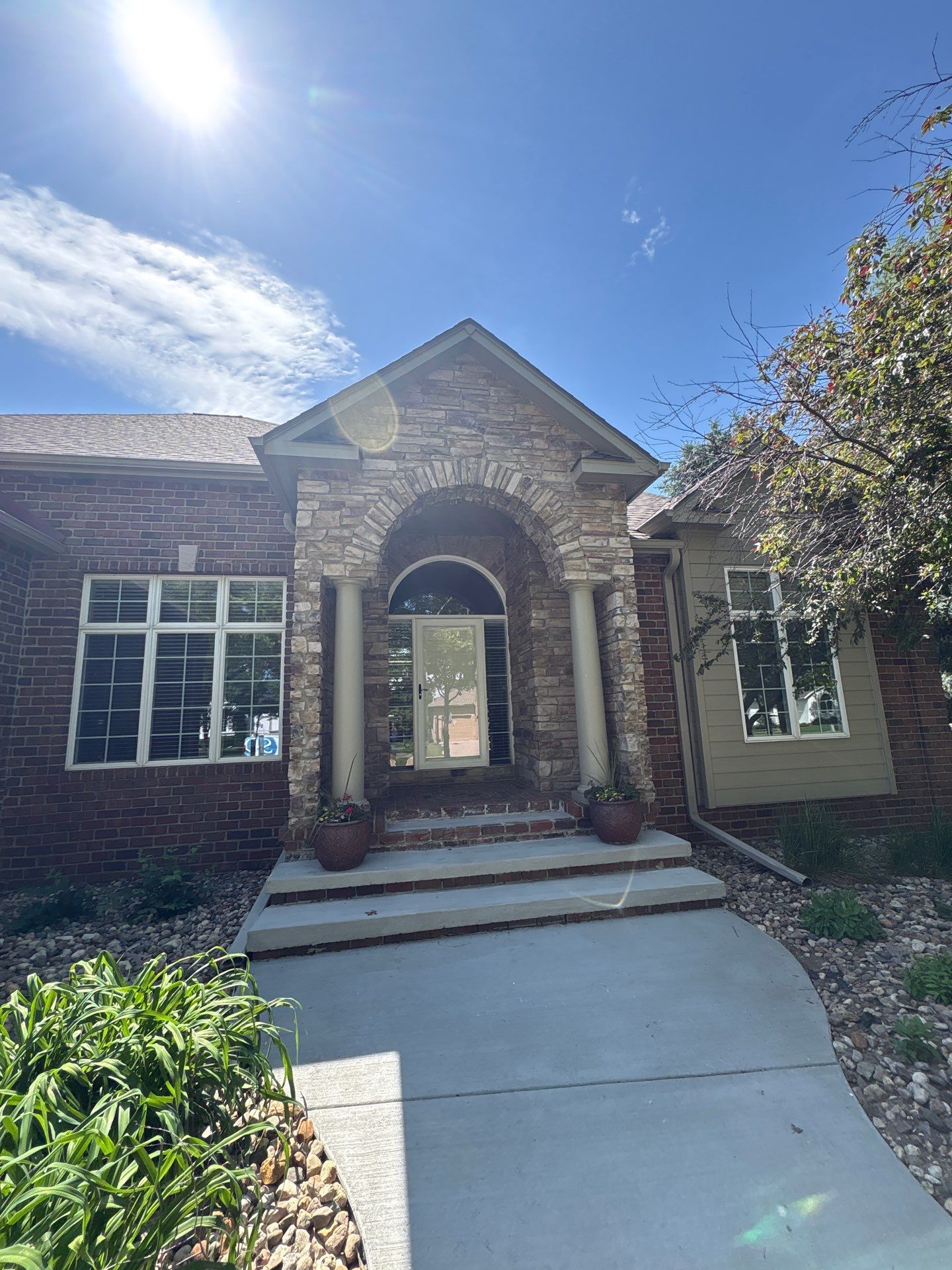 Sioux Falls Concrete Driveway Replacement and Custom Front Walkway by Select Painting, Coatings & Garage Cabinets