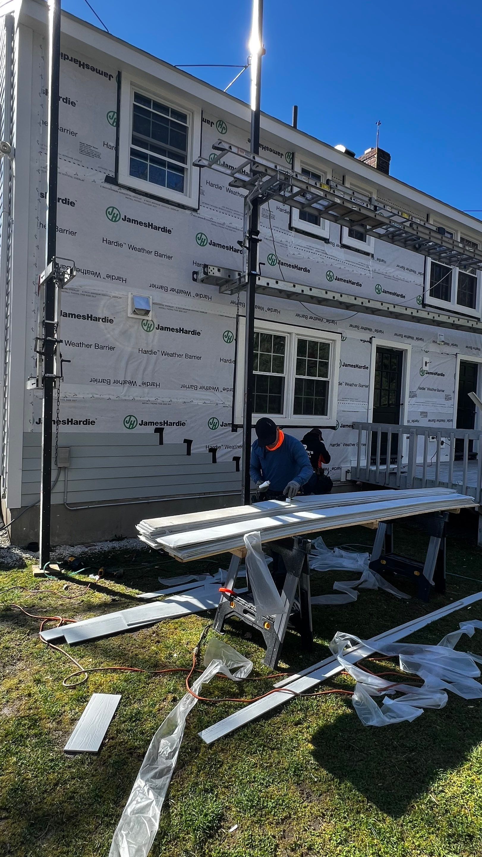 Custom window trim work and siding replacement in Dover, MA by UBrothers Construction