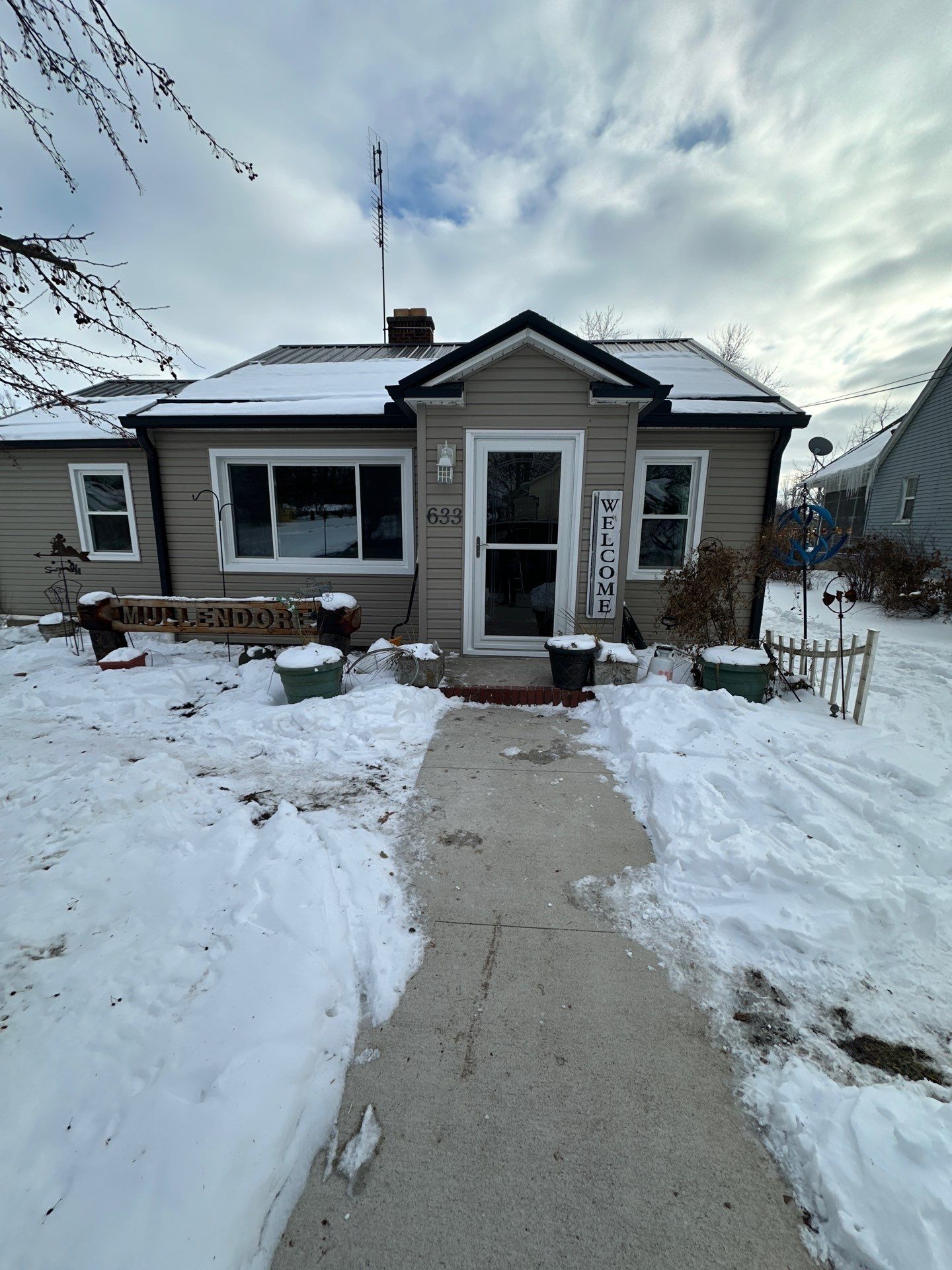 12 Replacement Triple Panes and 1 Entry Door in Columbia City, In by Window World Of Fort Wayne