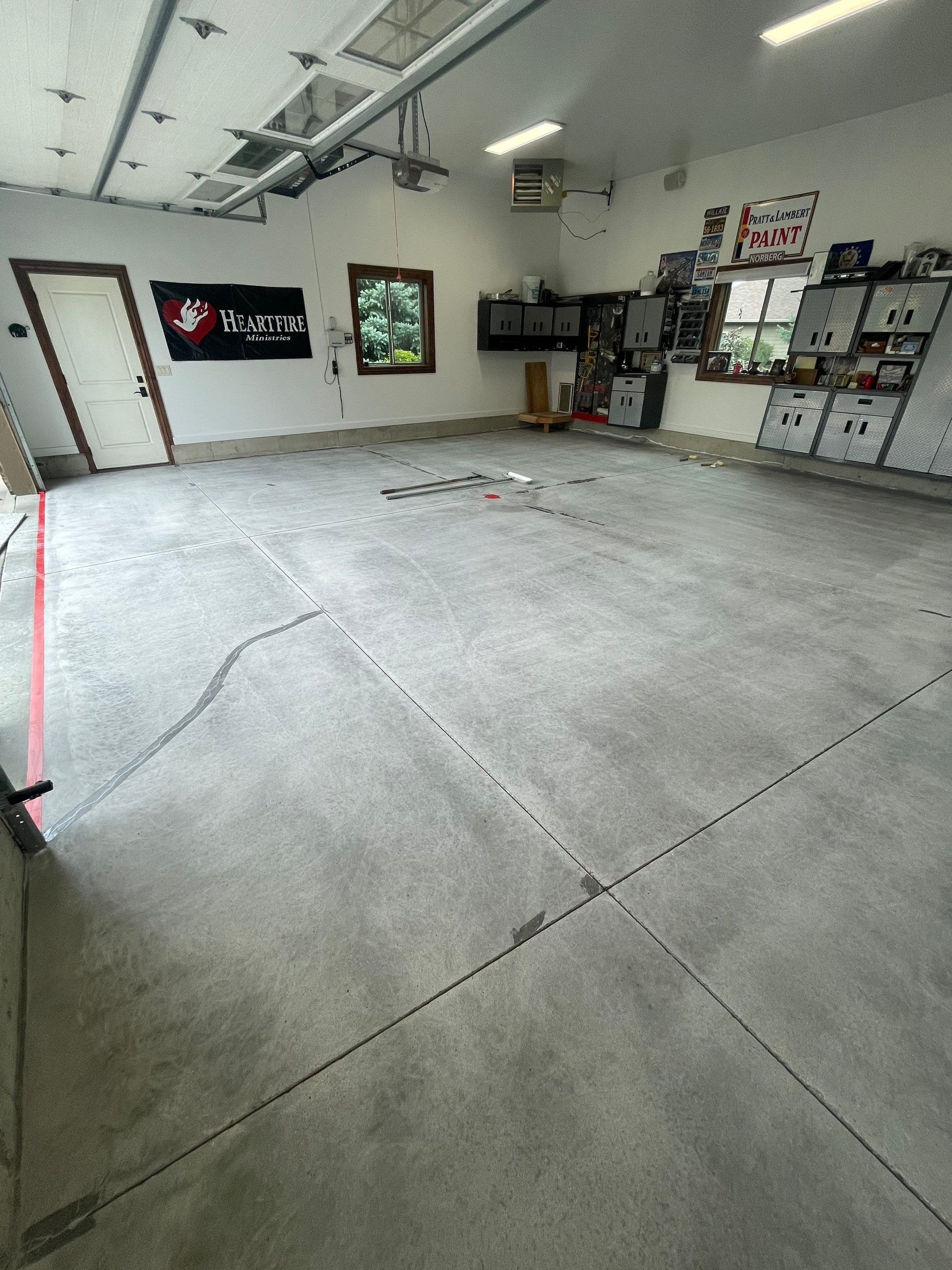 Garage Floor Coating and Domino Flake Finish in Sioux Falls by Select Painting, Coatings & Garage Cabinets