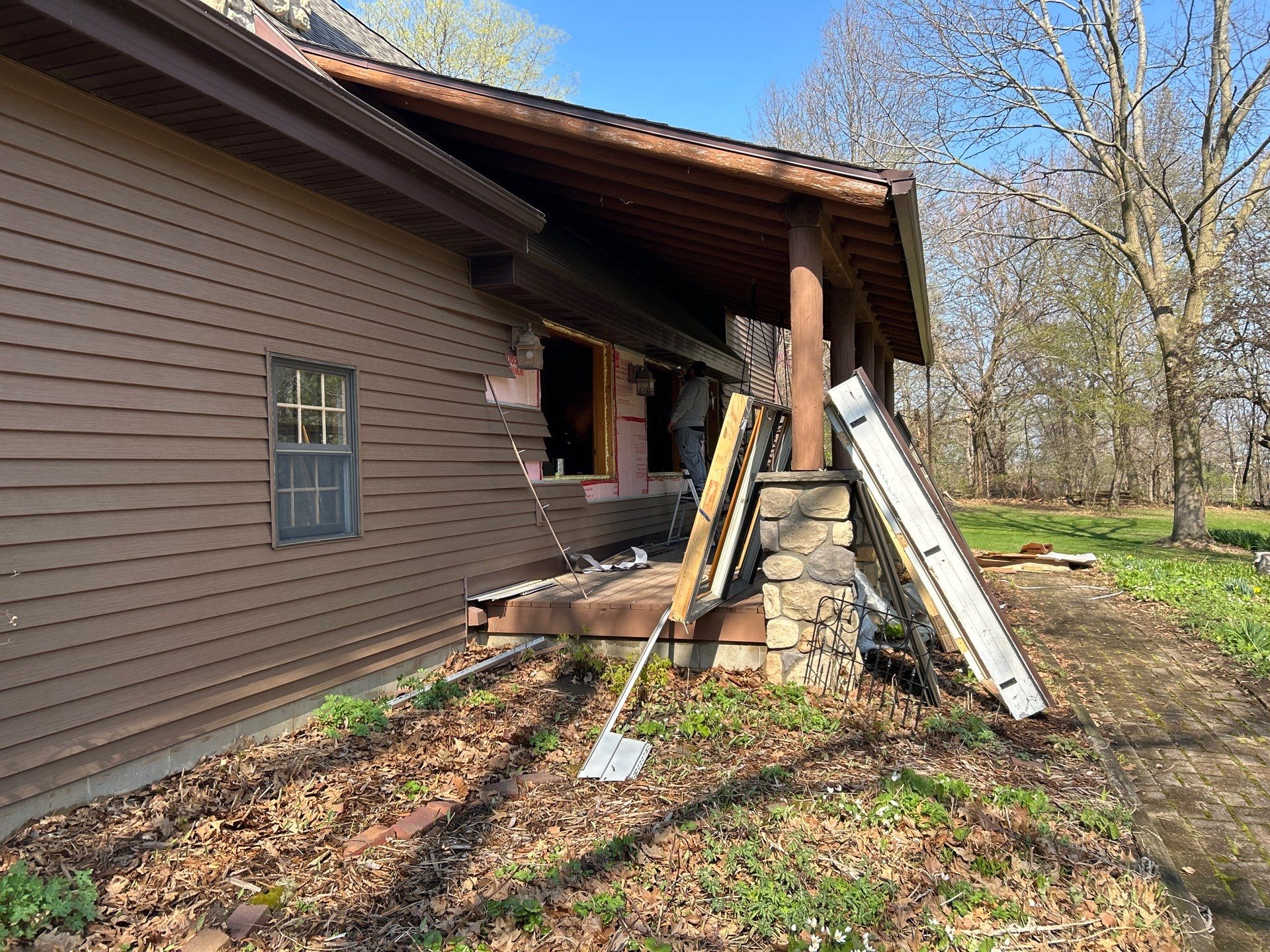 Pella Window installation using Pella Lifestyle wood/Aluminum window by United Windows and Siding LLC