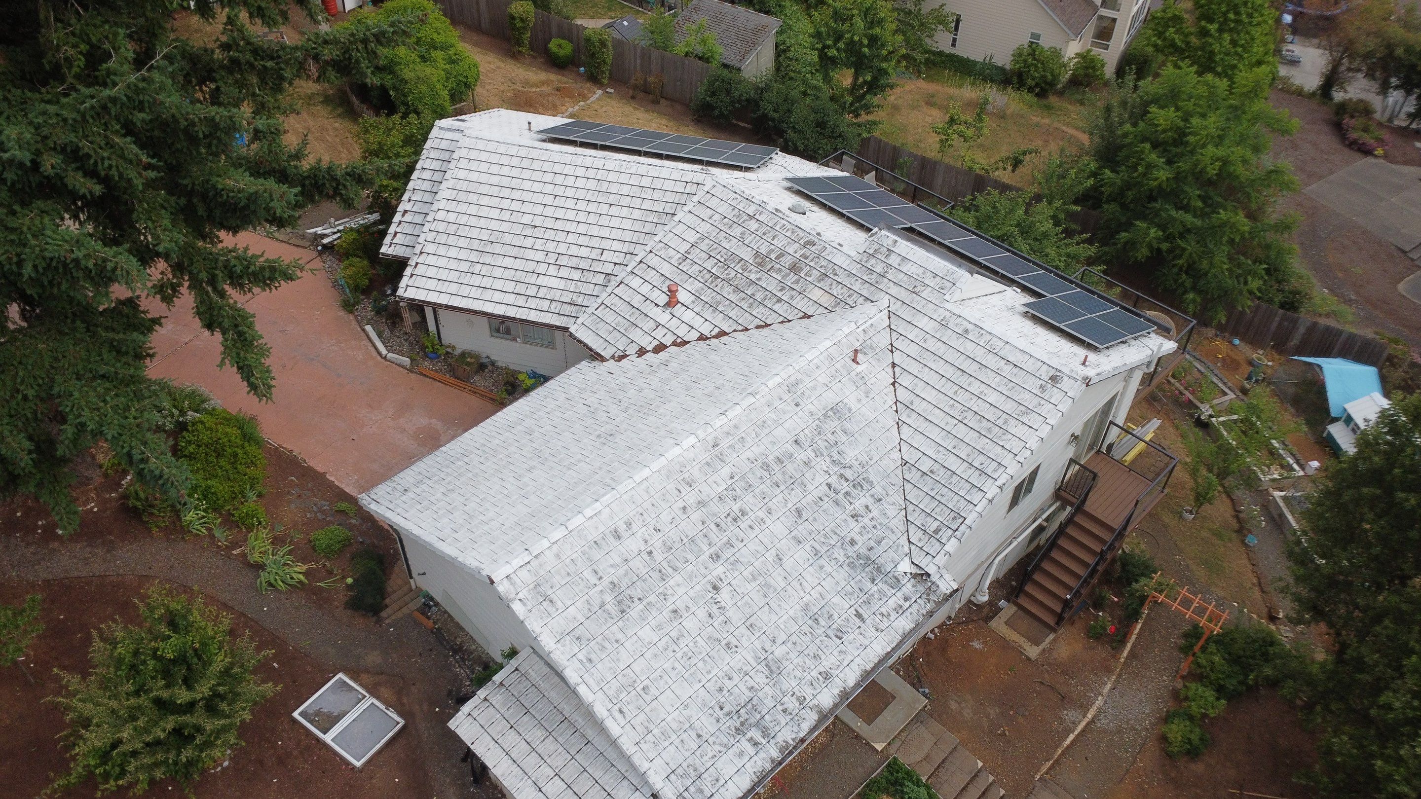 Granite Black Residential Roof Replacement by Orezona Building & Roofing Company, Inc.