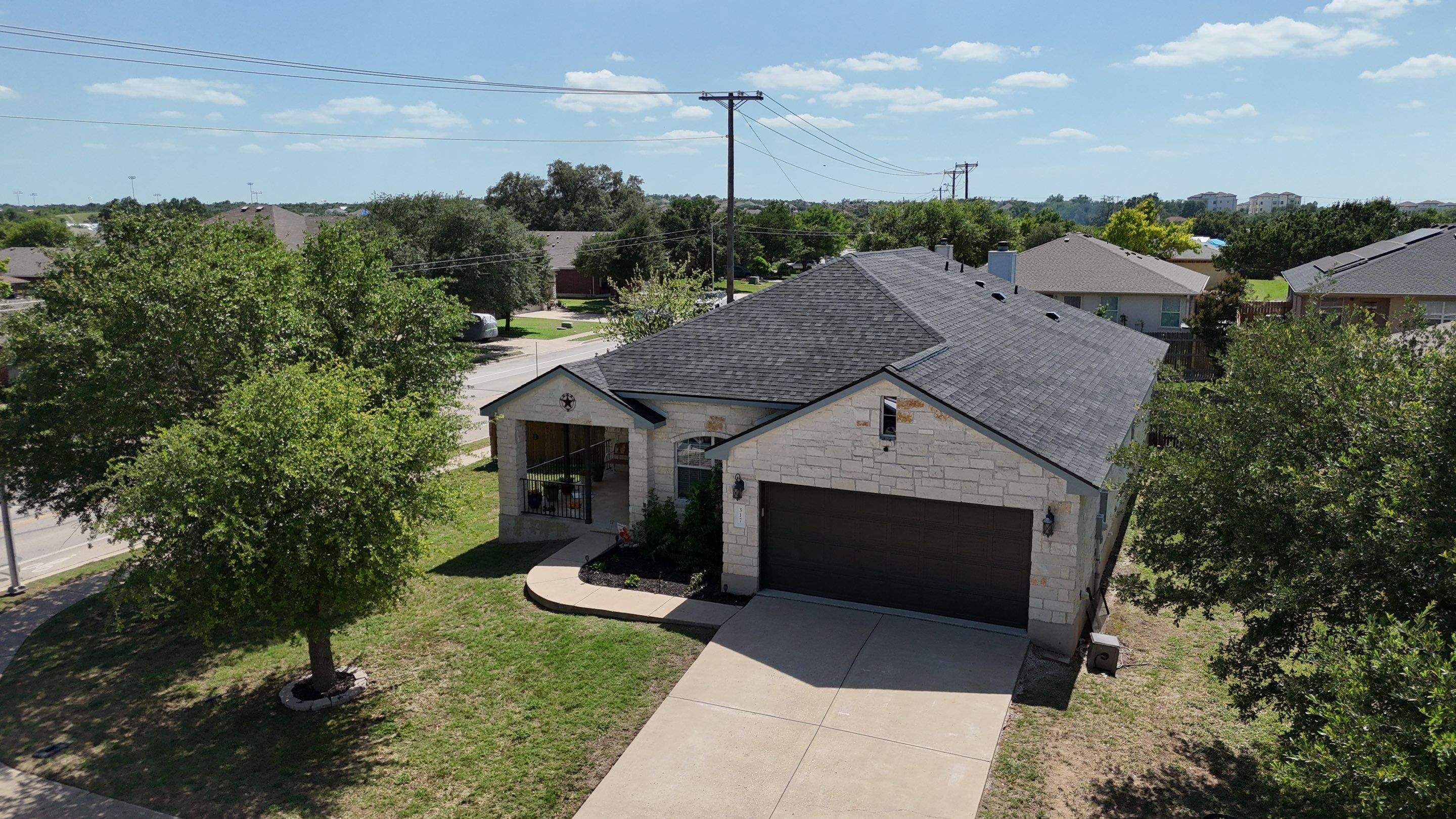 Granite Black Shingles by Perennial Roofing 