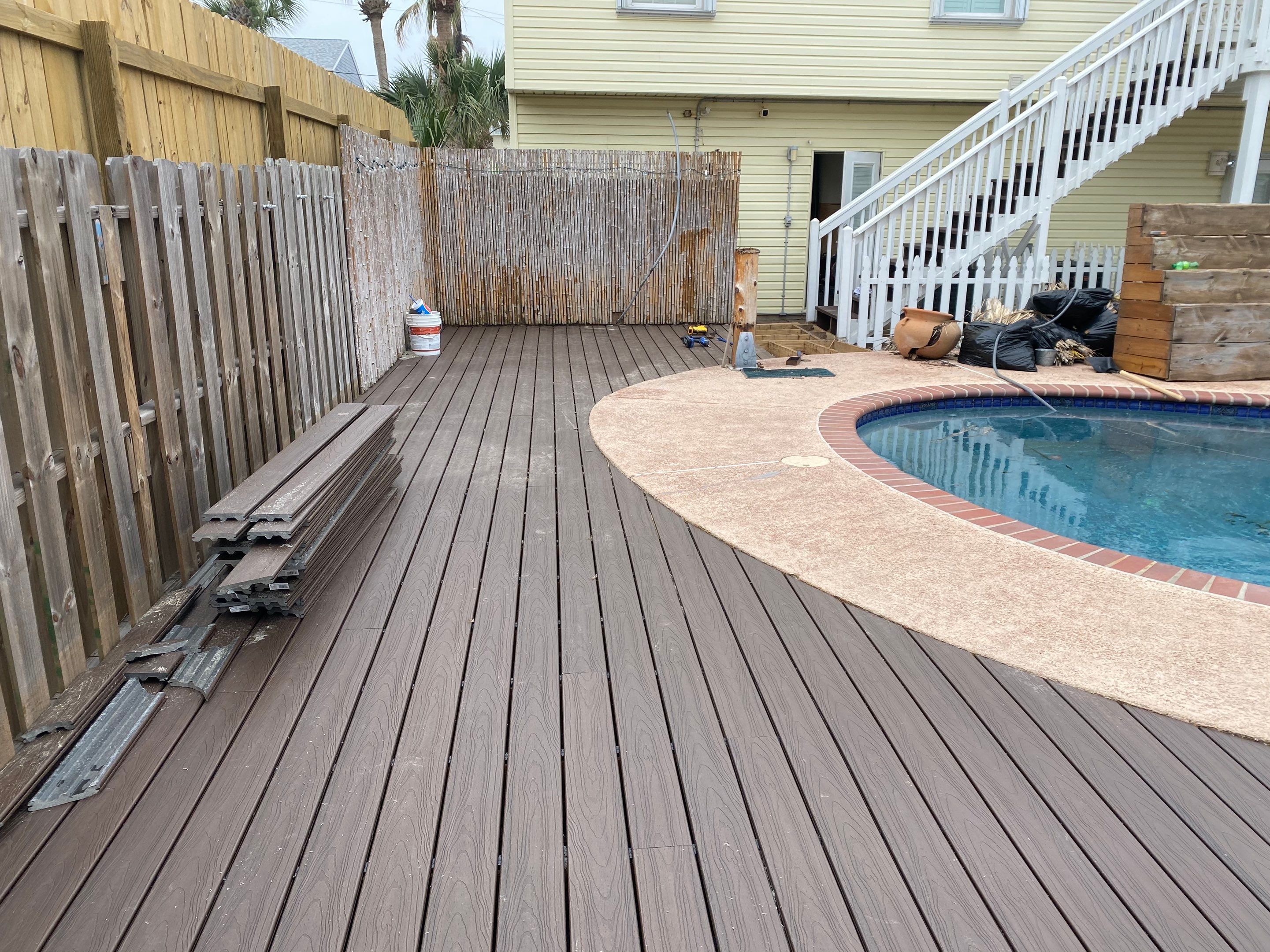 Poolside paradise by Bayfront Roofing and Construction