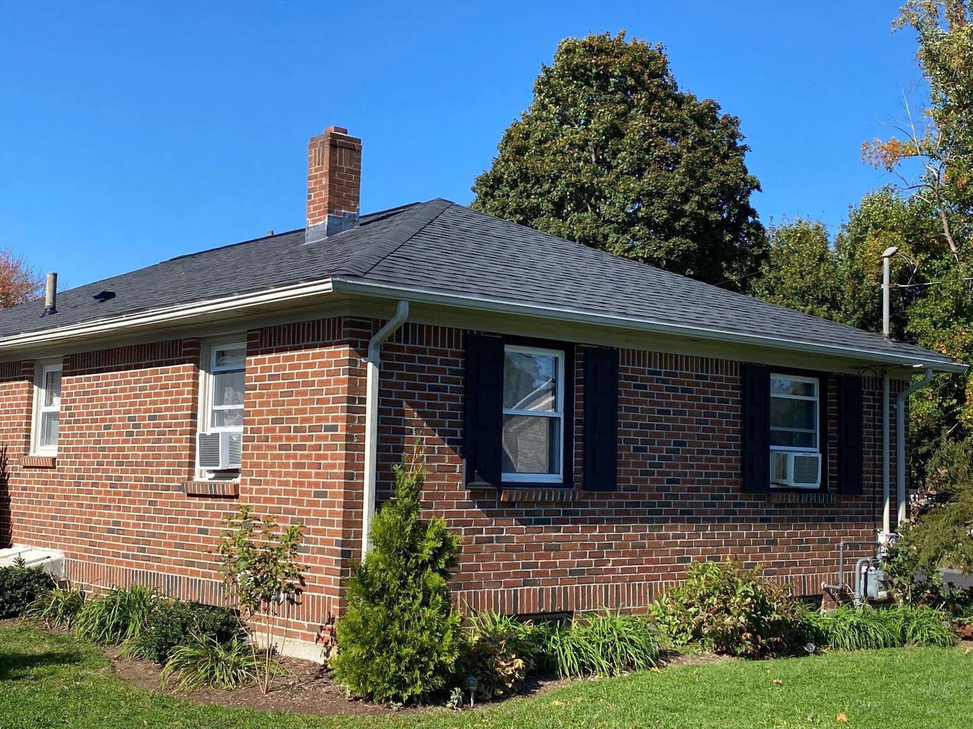 Pewterwood Roofs by Pinnacle Roofing & Skylights