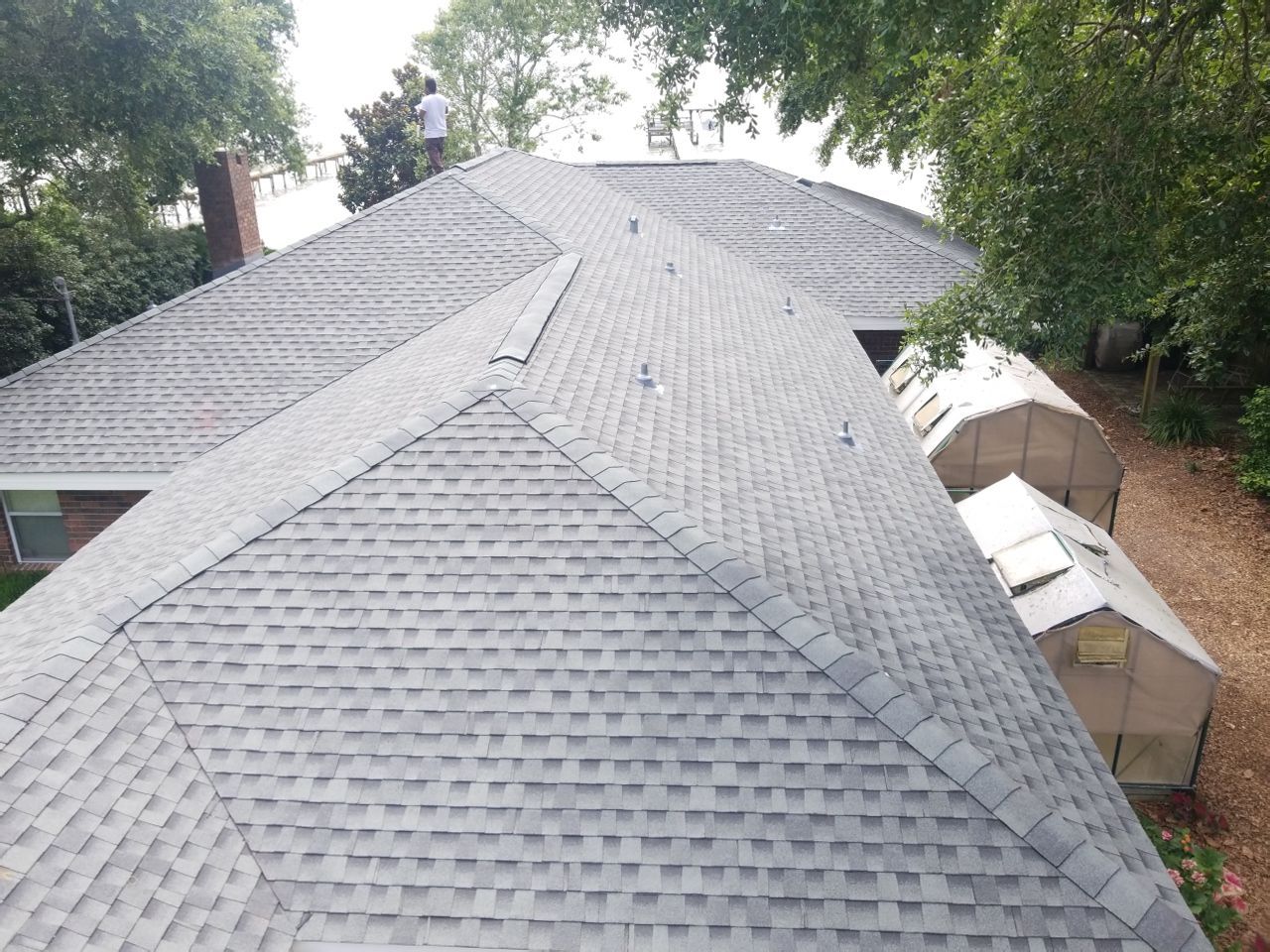 Residential Roofing Installation using Roof Replacement by American Roofing & Construction LLC
