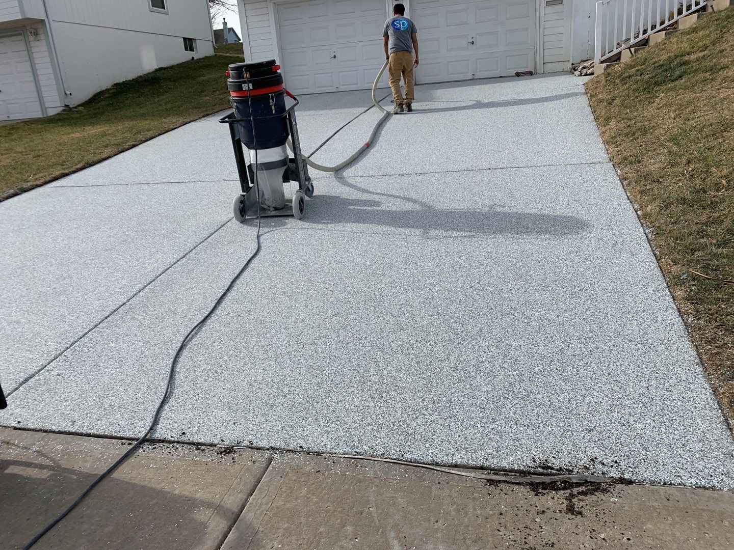 Driveway using Slate Stone by Select Painting, Coatings & Garage Cabinets