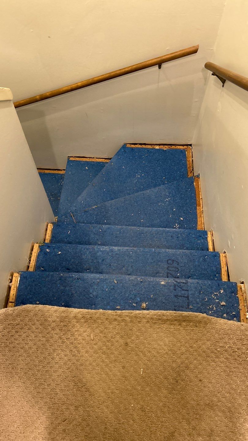 Parquet floor and stair treads by Footprints Floors of Nashville