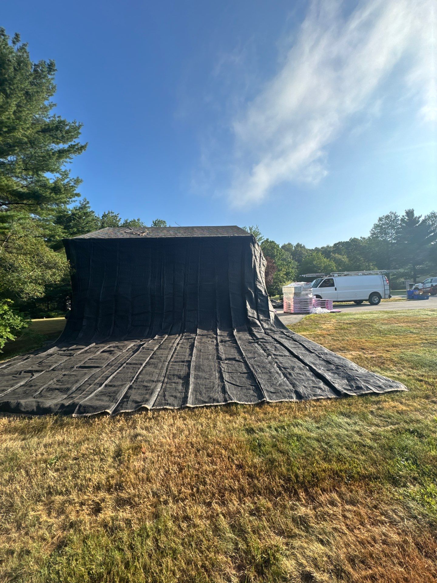 Complete Roof Replacement with Chimney Flashing, Gutter Guard System, and Vinyl Siding Repairs by Mighty Dog Roofing of Greater Middlesex County