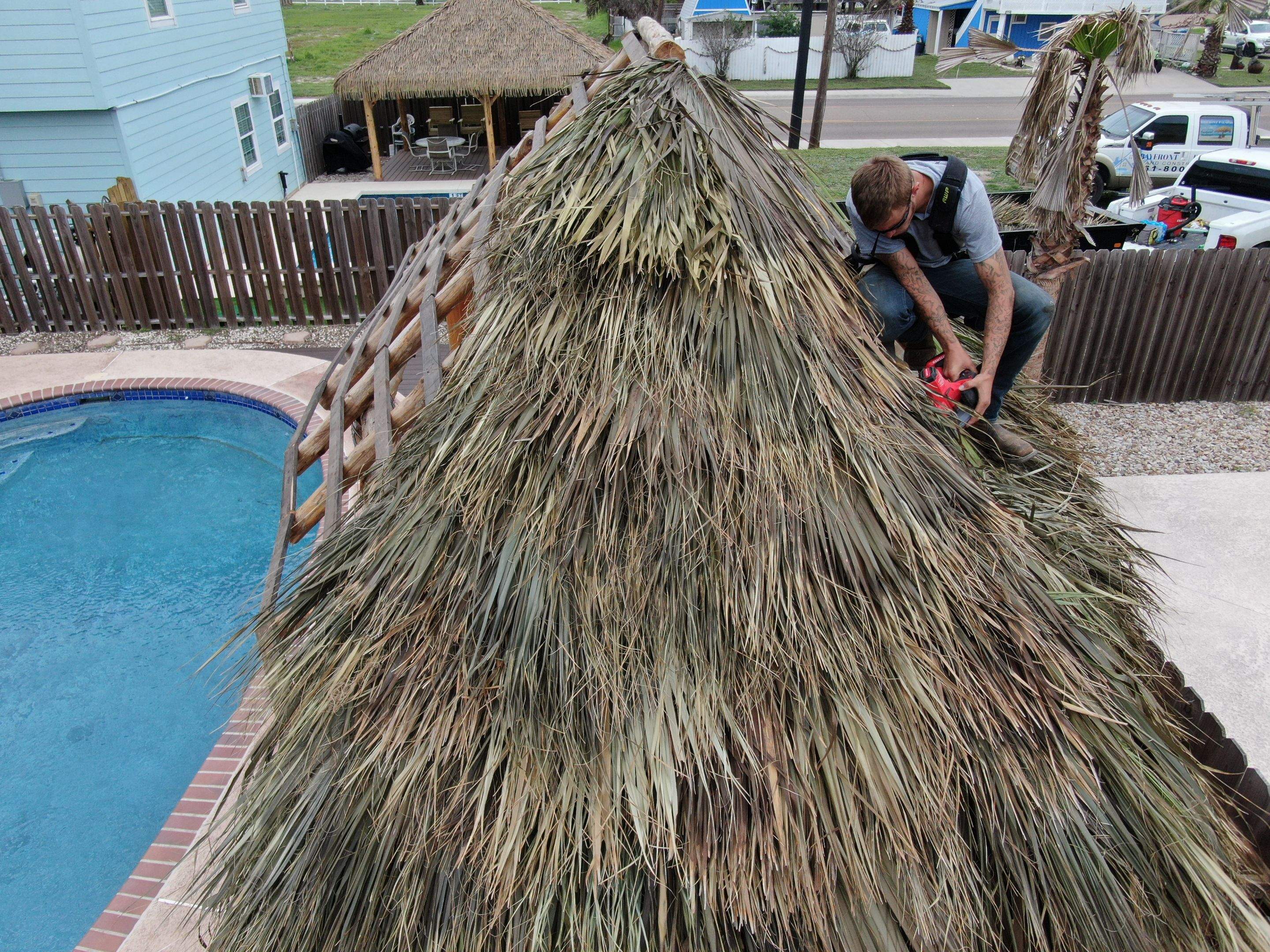 Poolside paradise by Bayfront Roofing and Construction