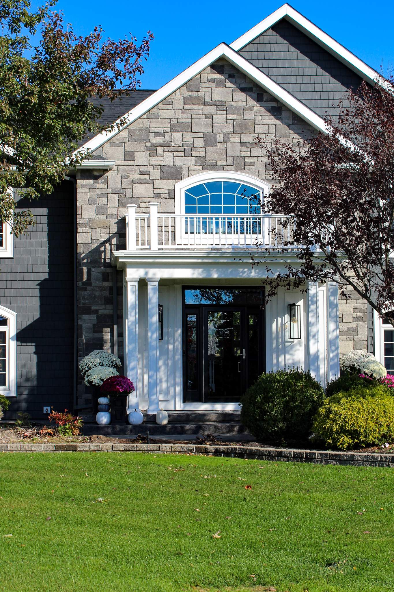 Exterior Renovations- Siding, Concrete, Railings, and Entry Door  by Ivy Lea Construction