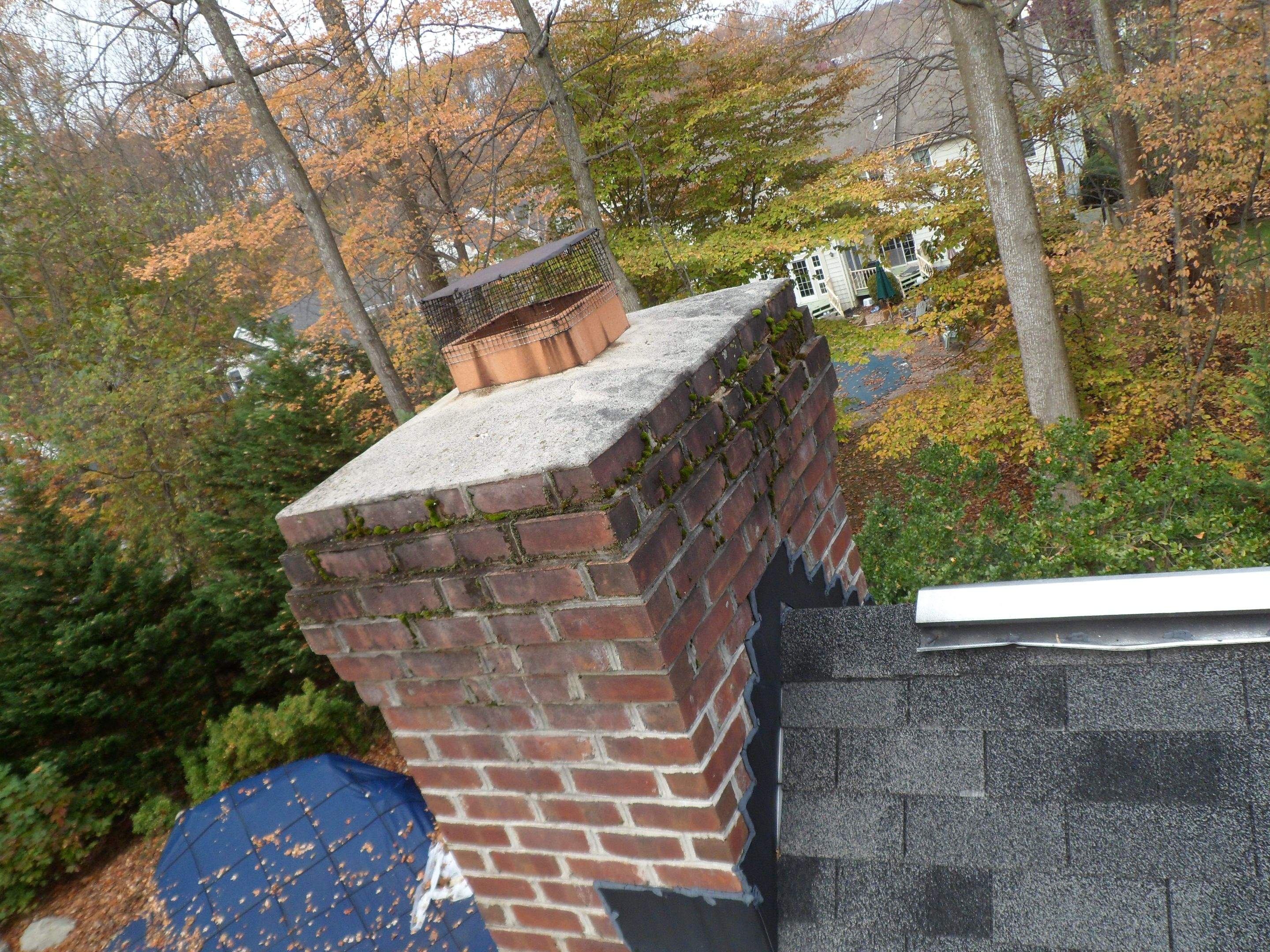 Residential Roofing Installation using Charcoal Black by Alpha Design Services