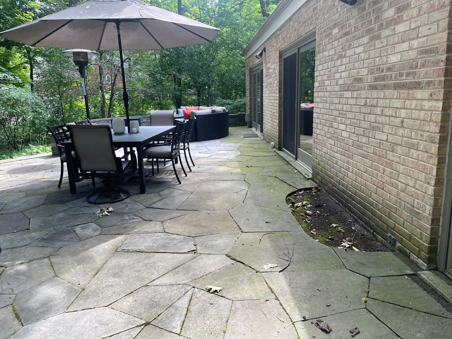 Bluestone patio cleaning by Northern Power Washing LLC.