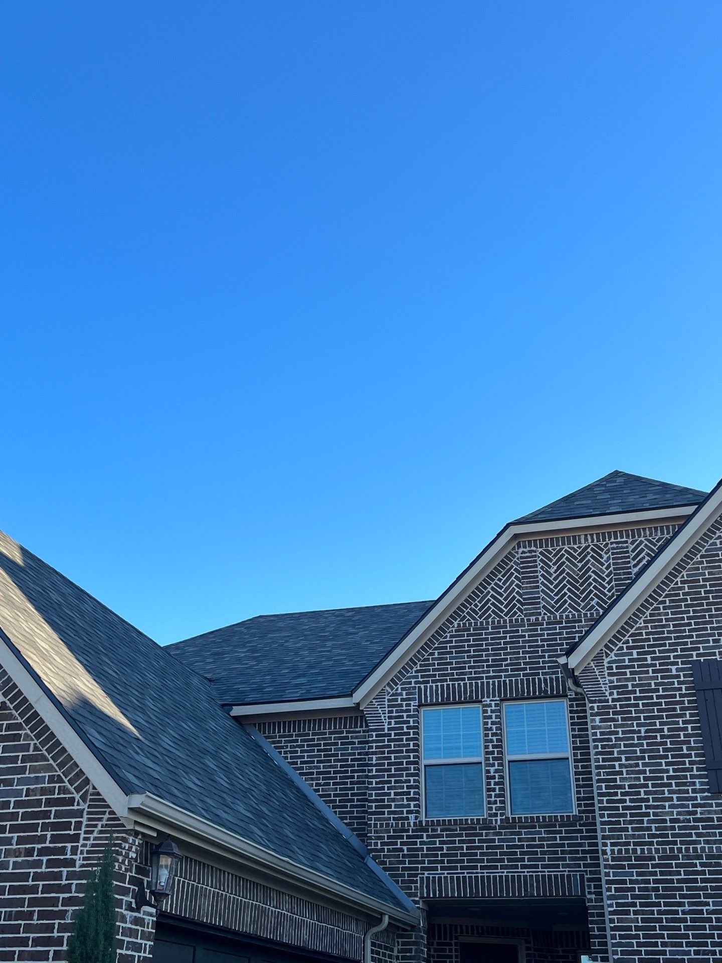 Red Brick with Malarkey Storm Grey by Tejas Roofworks + Restoration