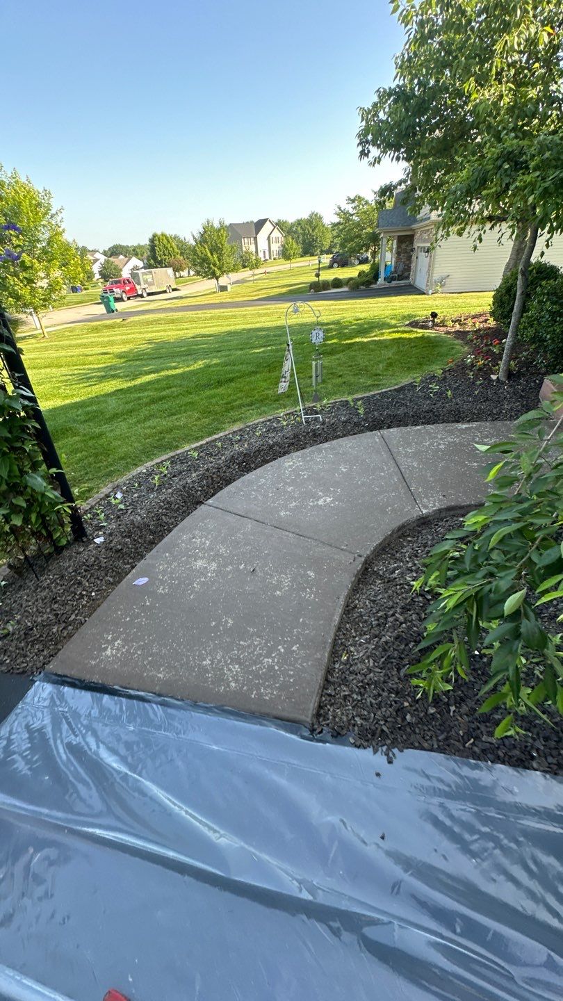 Porch + Walkway + Garage Project in Renfrew by Floors in a Day, Inc