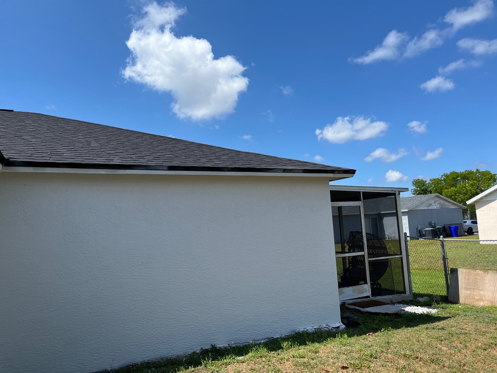 Black Seamless Gutters and Downspouts in Fort Myers FL by Gutter Professors