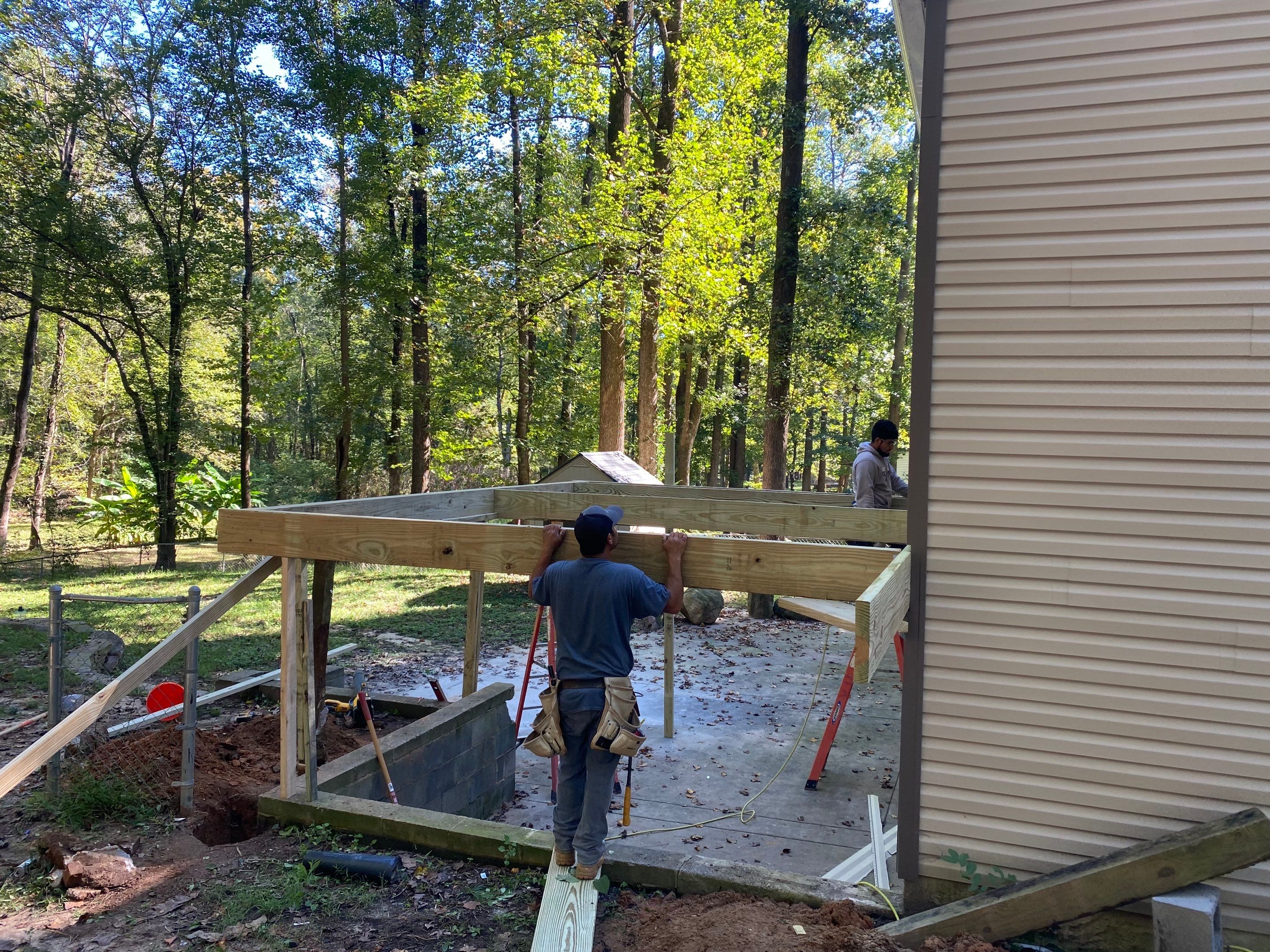 Custom Elevated Pressure-Treated Wood Deck Installation in Raleigh by The Remodeling Company