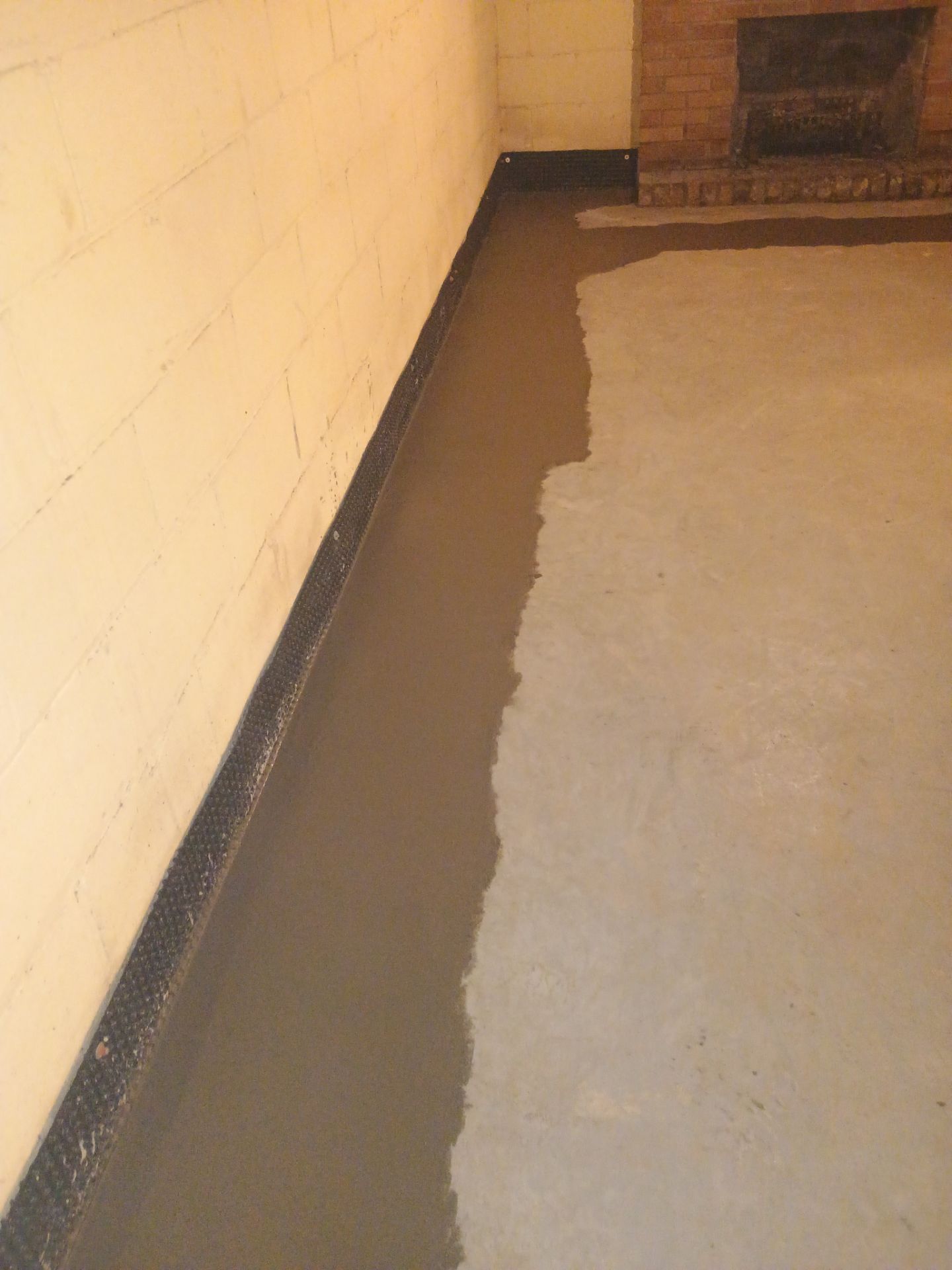 Drain Tile & Sump Pump for Kassie's Rental Property by Waterproofing Northeast