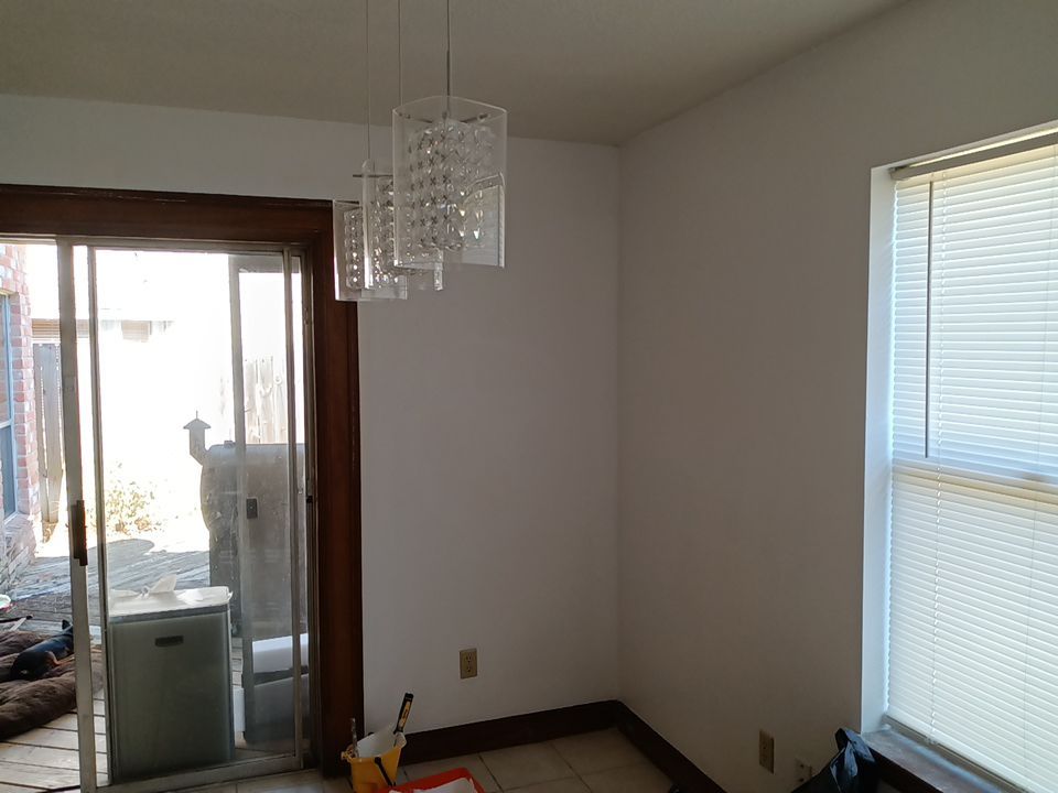 Interior and exterior painting project by Roof Concepts Construction