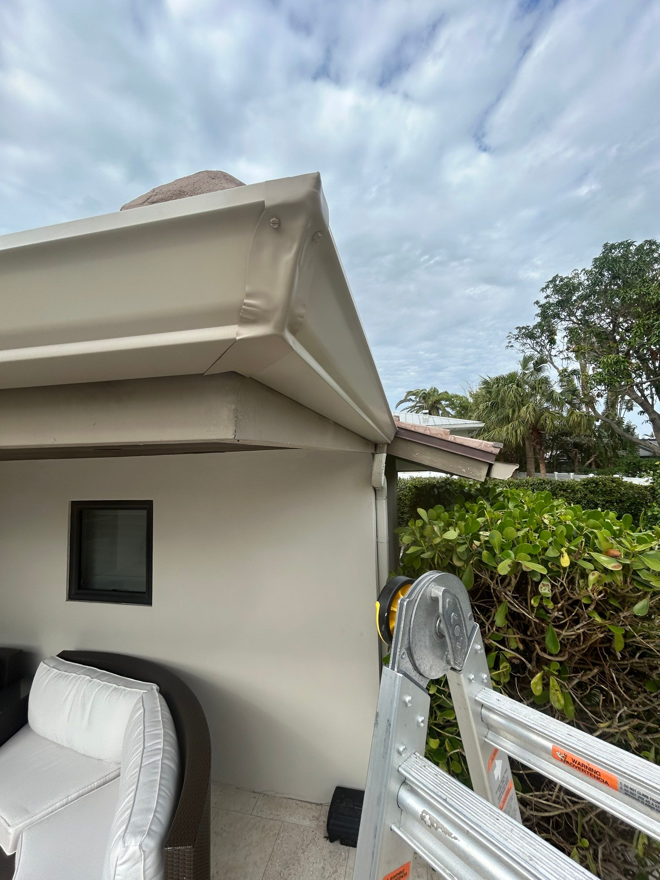 6-Inch White Seamless Gutters in Sarasota FL by Gutter Professors