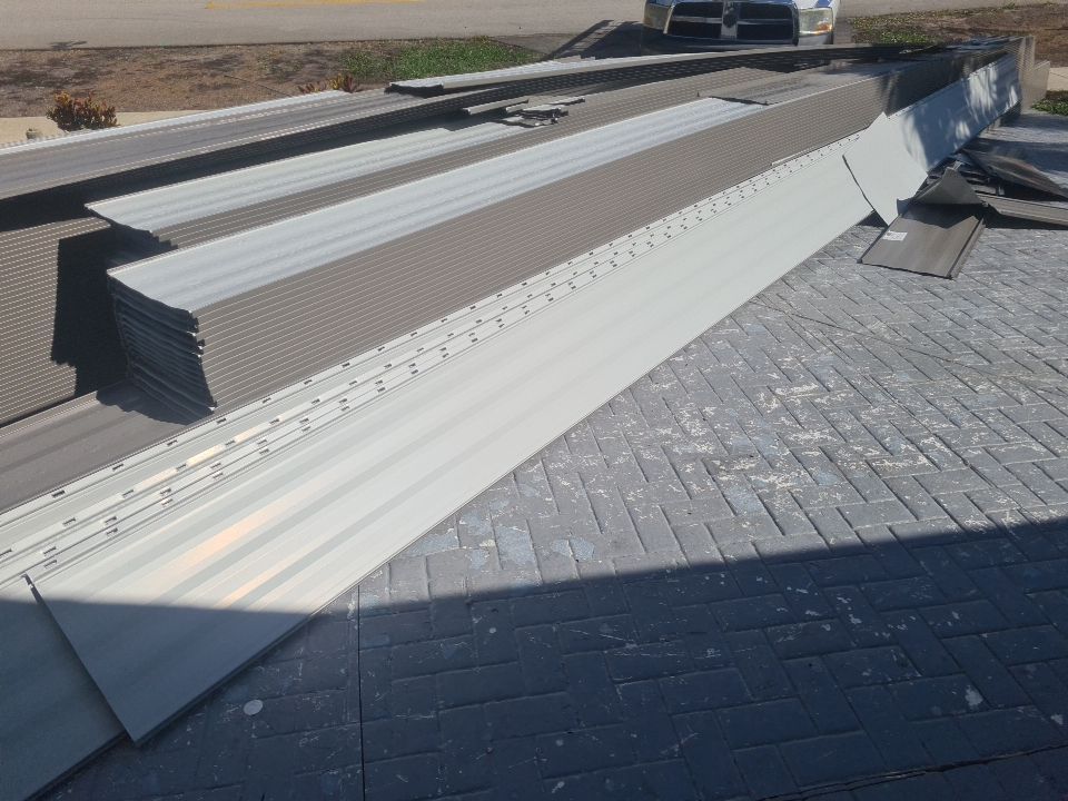 Residential Roofing Installation using 1" Nail strip metal roof by BLUES BROTHERS ROOFING
