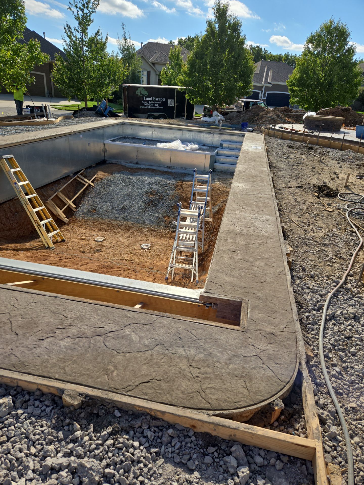Back Yard Pool Patio by LAND ESCAPES LLC
