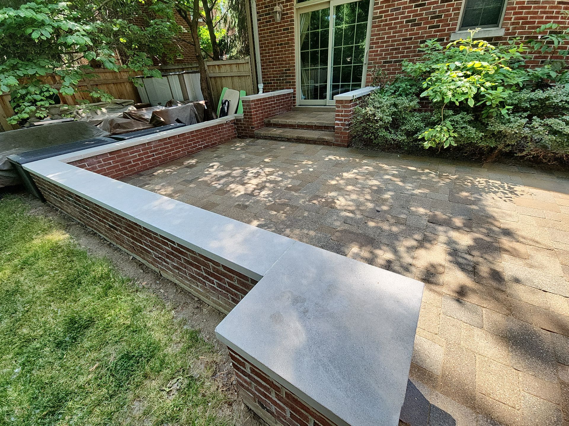 Brick paver repair, clean, seal and poly sanding by Northern Power Washing LLC.