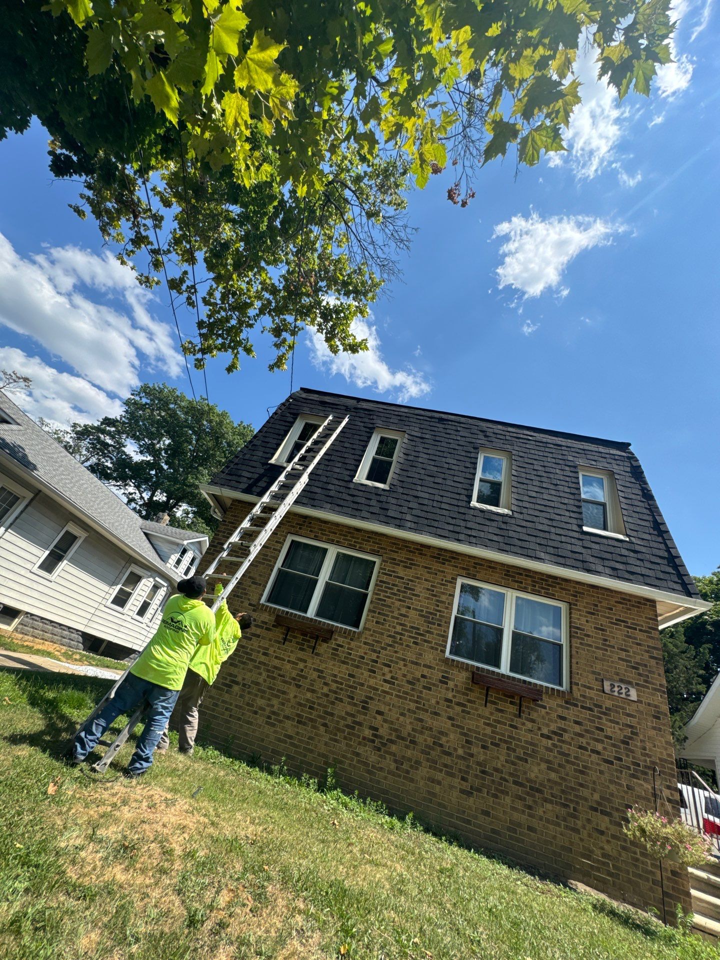 Moire Black Shingles by Reimagine Roofing