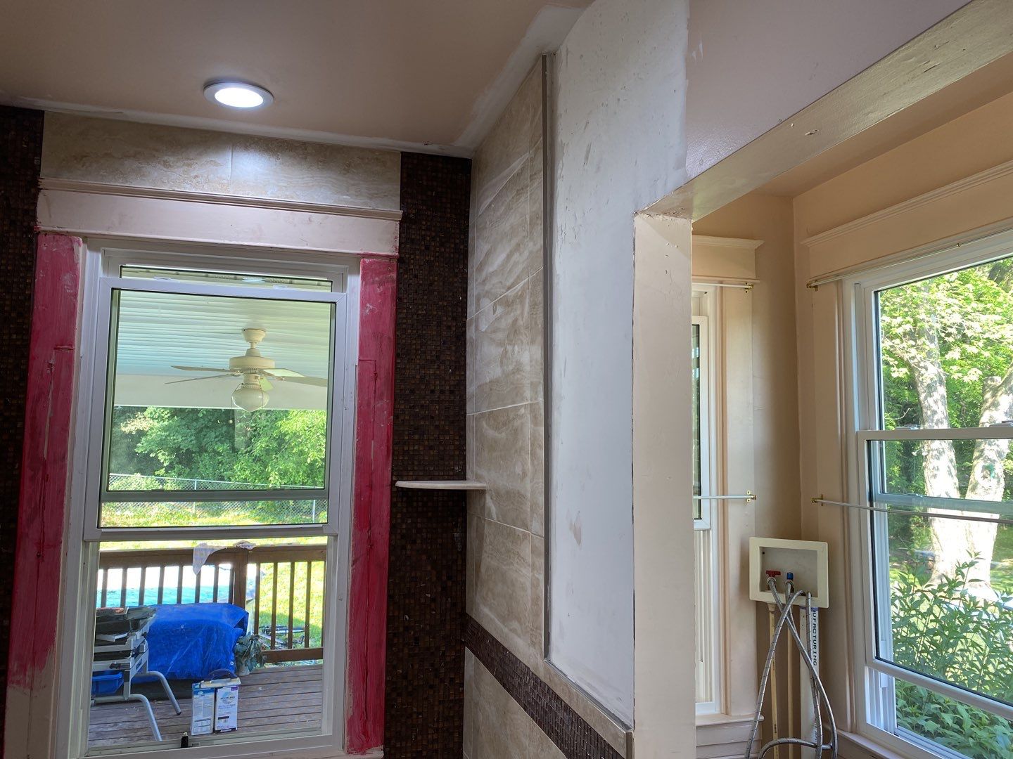 Bathroom Remodel using New Bathroom Tile and Tube by Alpha Design Services
