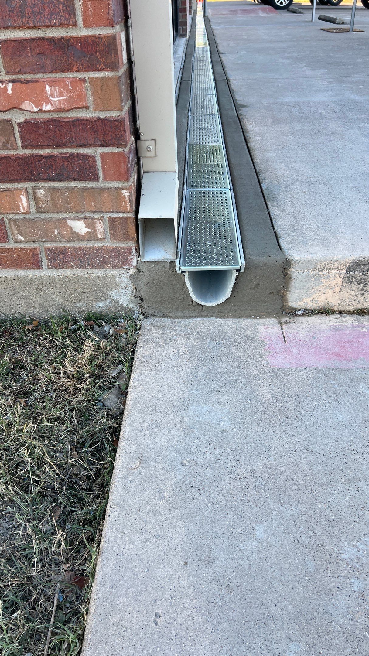 Drainage System Installation and Metal Roof Repairs by Harvey Roofing & Construction