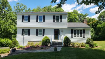 Siding update with Cert Cedar Impressions D/7 perfection straight bottom, White & Cert. Monogram D/4 x 25' clapboard, White